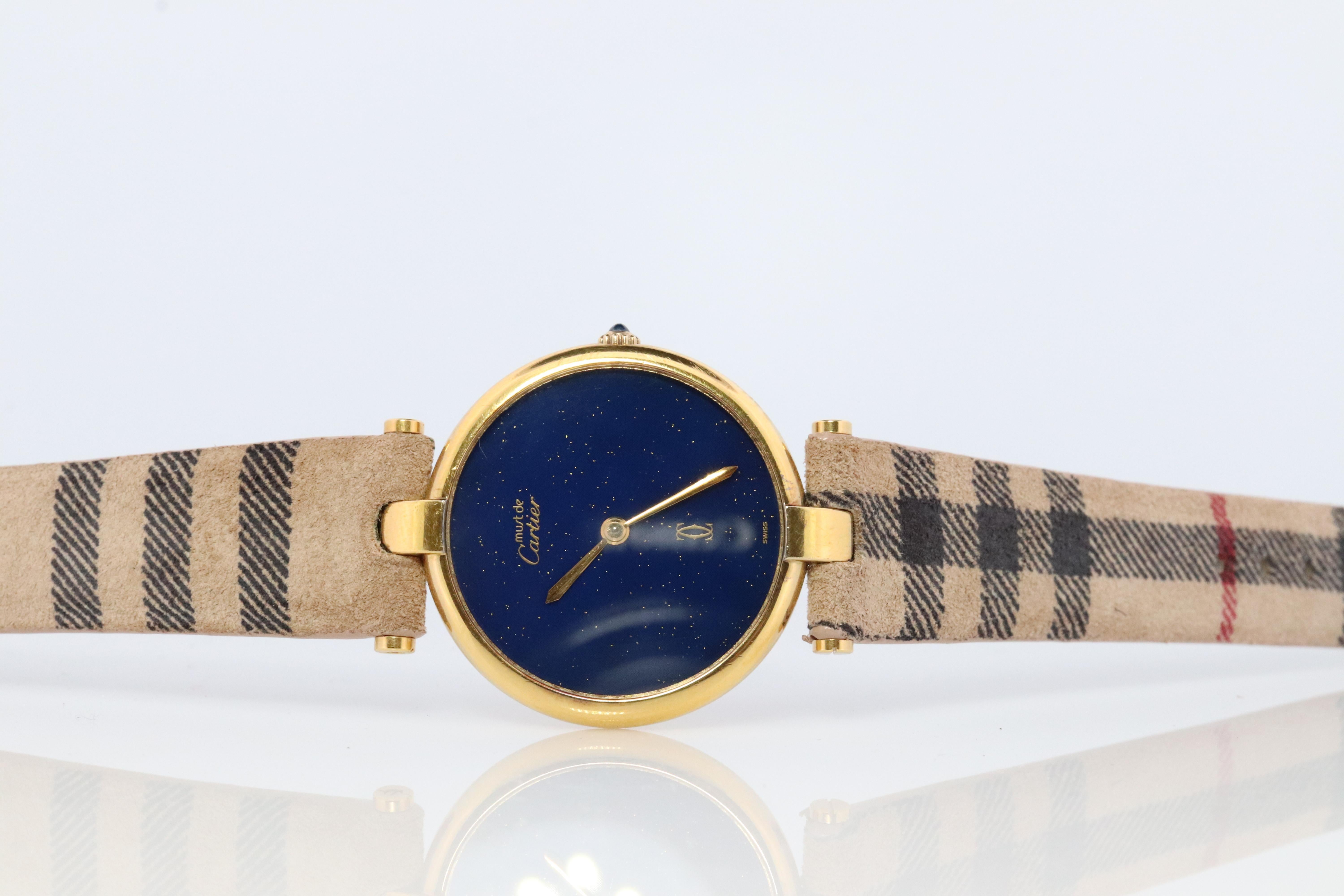 Genuine Cartier watch.
30mm Large Round Case.

Vintage Must de Cartier Vendome

Night Blue Sky Dial.

Sapphire Cabochon Crown.

Condition: Comes with Cartier case. Wear consistent with age. New  Plaid Leather Band. Original Cartier Buckle. 


New