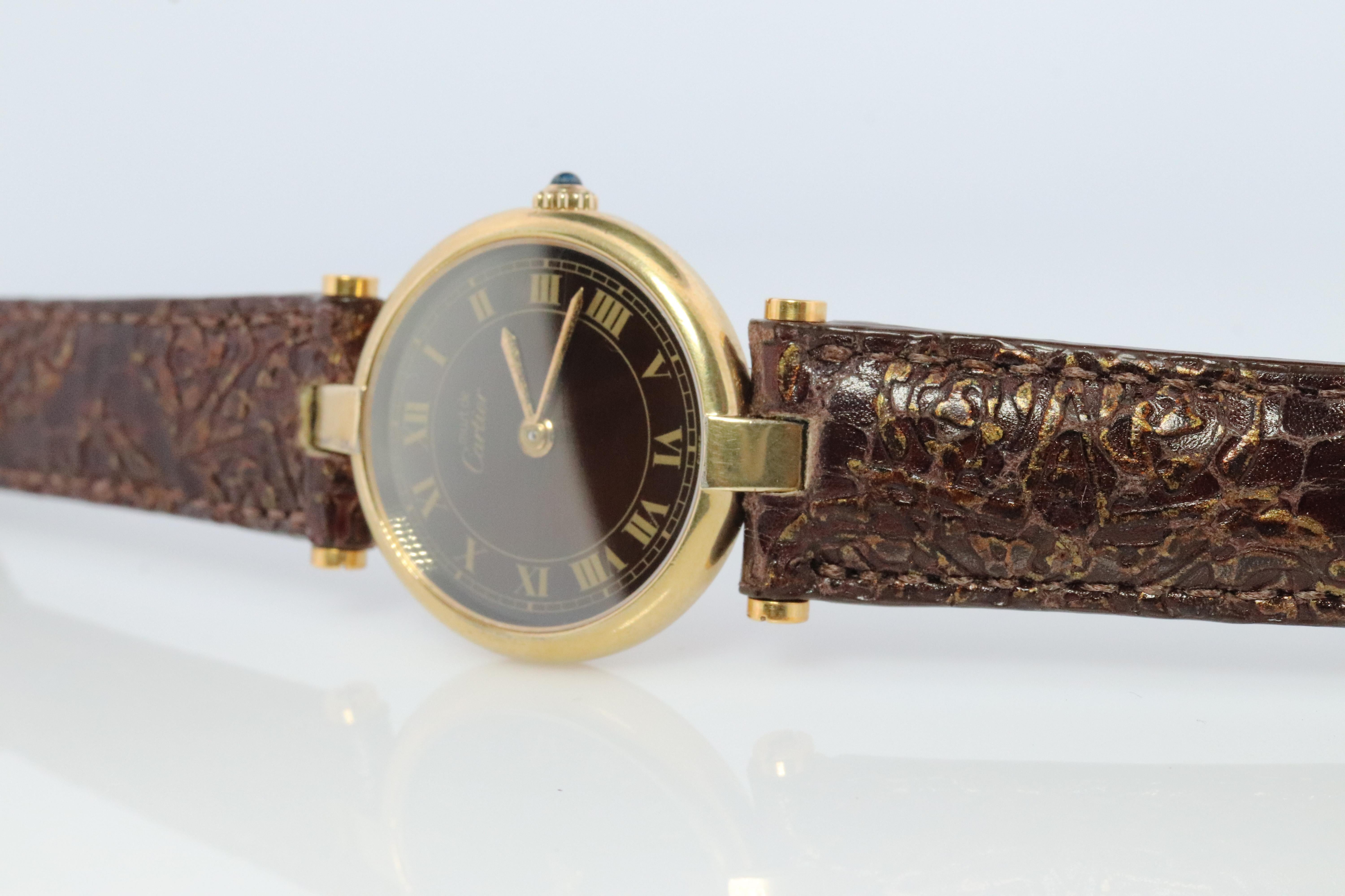 cartier brown face