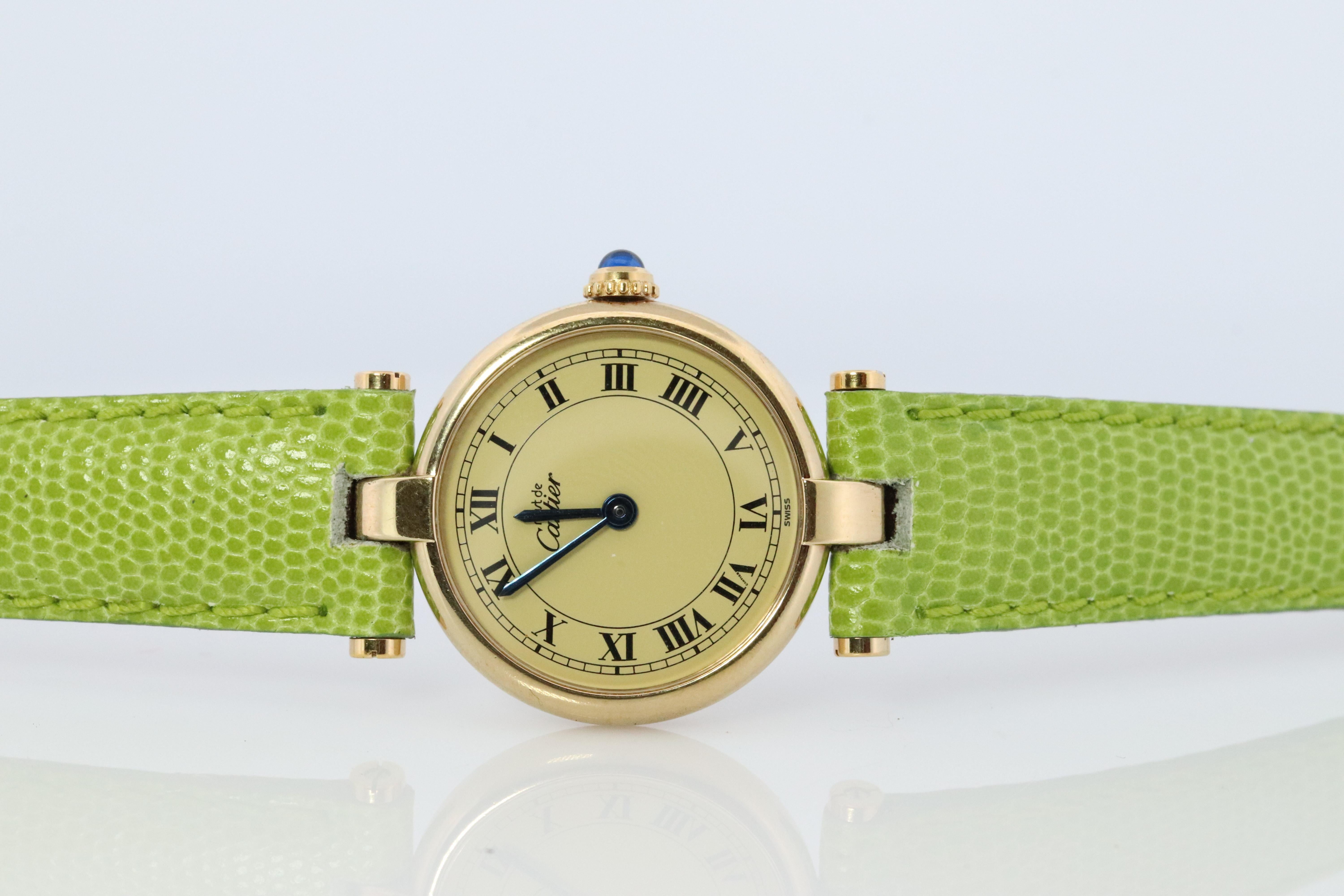 Genuine Cartier watch.

Vintage Must de Cartier Vendome

Rare Cream dial.

Sapphire Cabochon Crown.


New Green Gucci Band with Original Cartier Buckle.
--Have other colors if you prefer.

Condition: Wear consistent with age. New GUCCI genuine