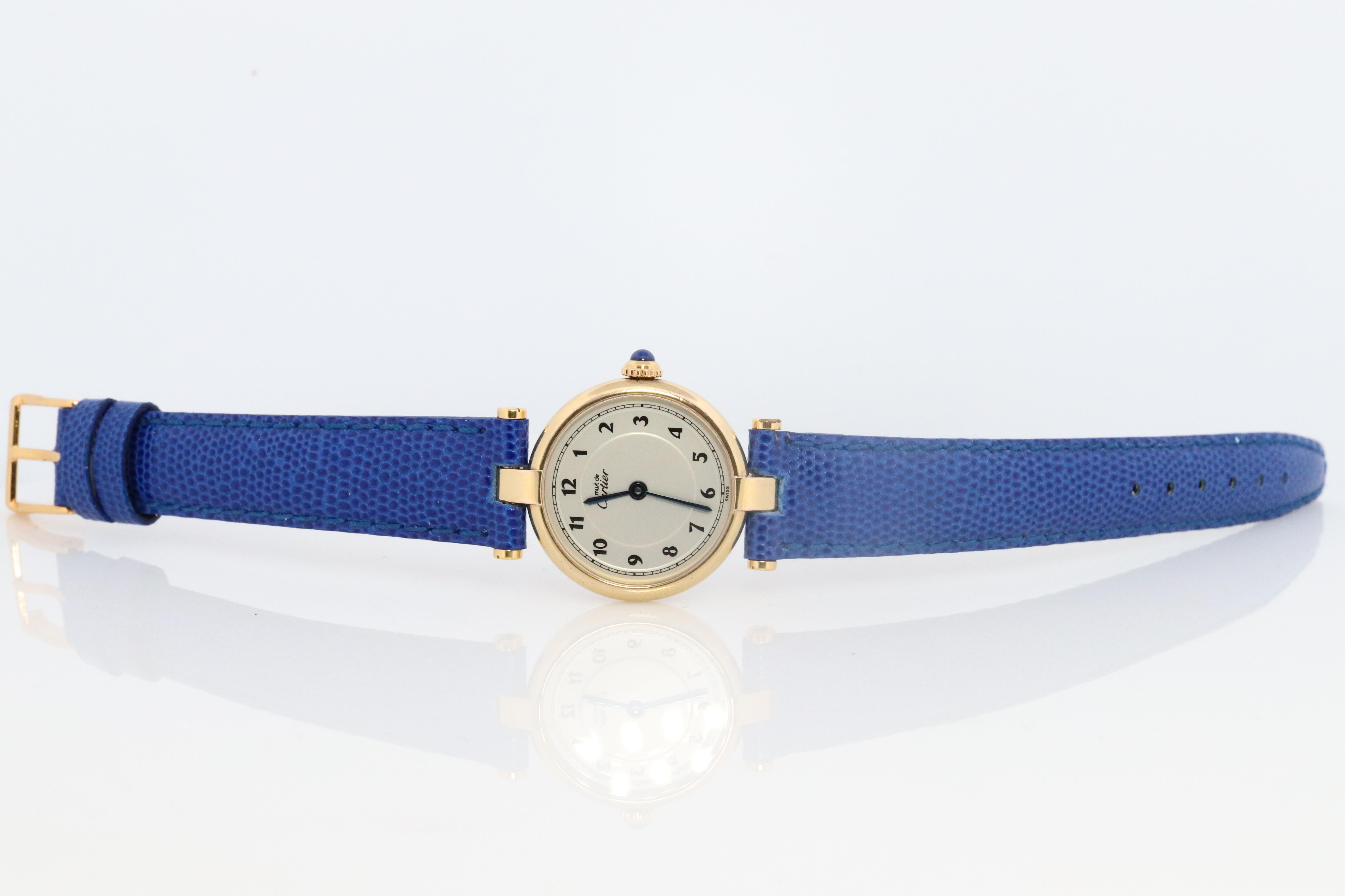 Genuine Cartier watch.

Vintage Must de Cartier Vendome

Rare White dial with Arabic Numbers

Sapphire Cabochon Crown.

New Gucci Leather Band 

Condition: Comes with Cartier Box. Wear consistent with age. New genuine Gucci leather blue band.


New