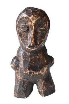 Genuine carved bone  statue from the Lega tribe, DR Congo, early 1900