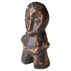 Genuine carved bone  statue from the Lega tribe, DR Congo, early 1900