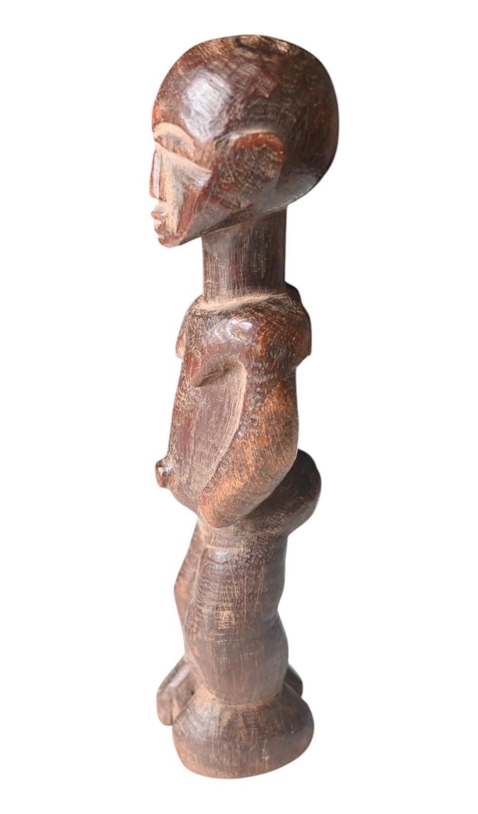 Ghanaian Genuine carved wooden statue from the Lobi tribe, Ghana Burkina Faso, early 1900 For Sale