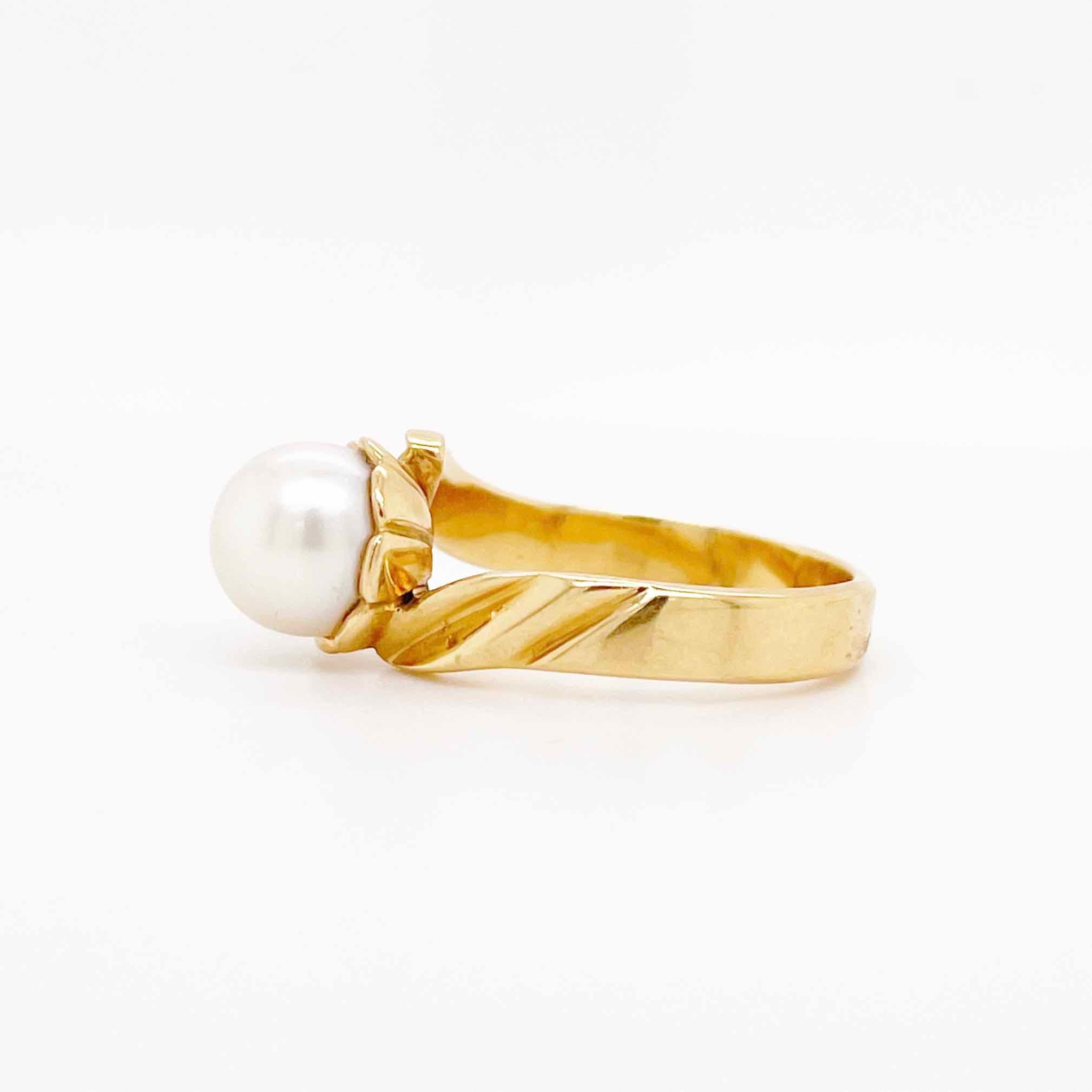 This sleek design makes this ring suitable for any outfit. It can be worn to a nice event or as a day-to-day piece. The asymmetrical band makes this ring unique while still keeping a simple design. The details for this beautiful ring are listed