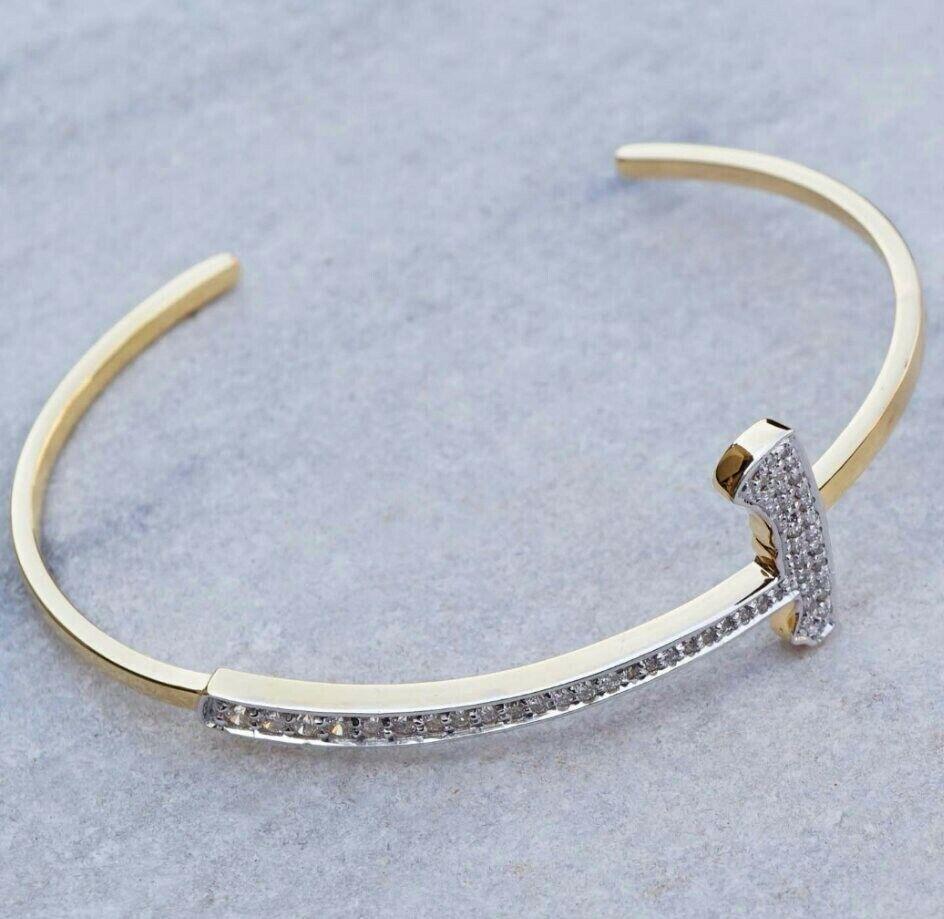 Bracciale a T con diamanti autentici in oro massiccio 14k per donne, regalo elegante
Leggero, può essere indossato tutti i giorni

Informazioni aggiuntive:
Condit: Nuovo con etichette: Un articolo nuovo di zecca, non usato e non indossato (compresi