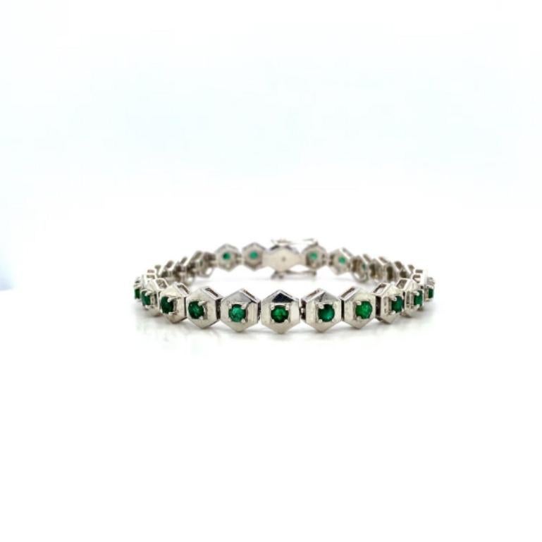 Beautifully handcrafted silver Genuine Emerald Hexagon Bracelet, designed with love, including handpicked luxury gemstones for each designer piece. Grab the spotlight with this exquisitely crafted piece. Inlaid with natural emerald gemstones, this