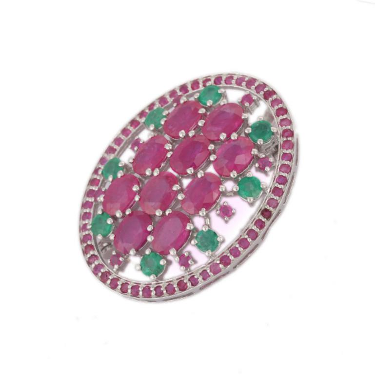 This Emerald Ruby Studded Big Oval Shape Brooch enhances your attire and is perfect for adding a touch of elegance and charm to any outfit. Crafted with exquisite craftsmanship and adorned with dazzling ruby and emerald where ruby enhances