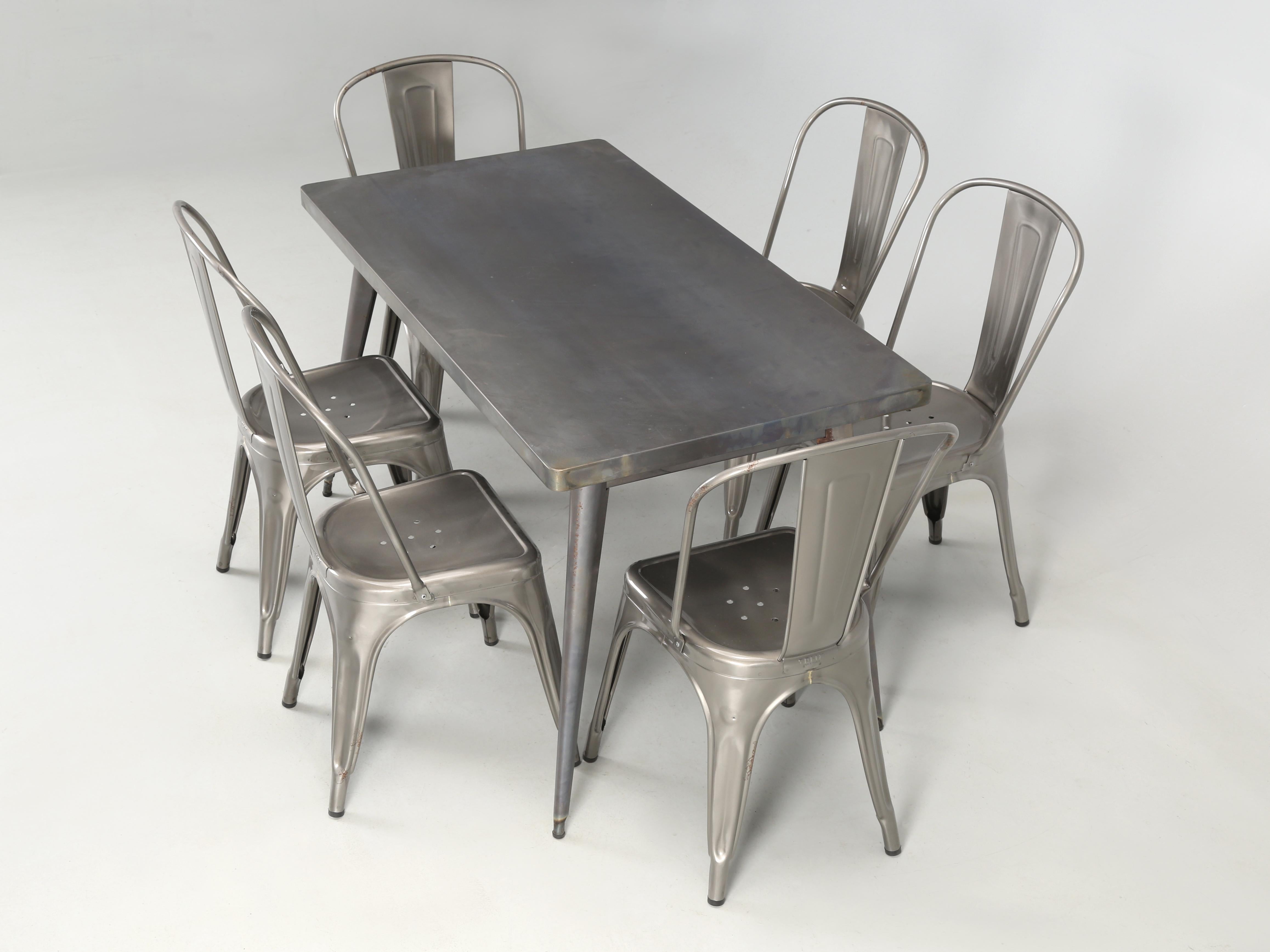 Industrial Genuine French Tolix Table in Raw Steel with '6' Matching Steel Stacking Chairs For Sale