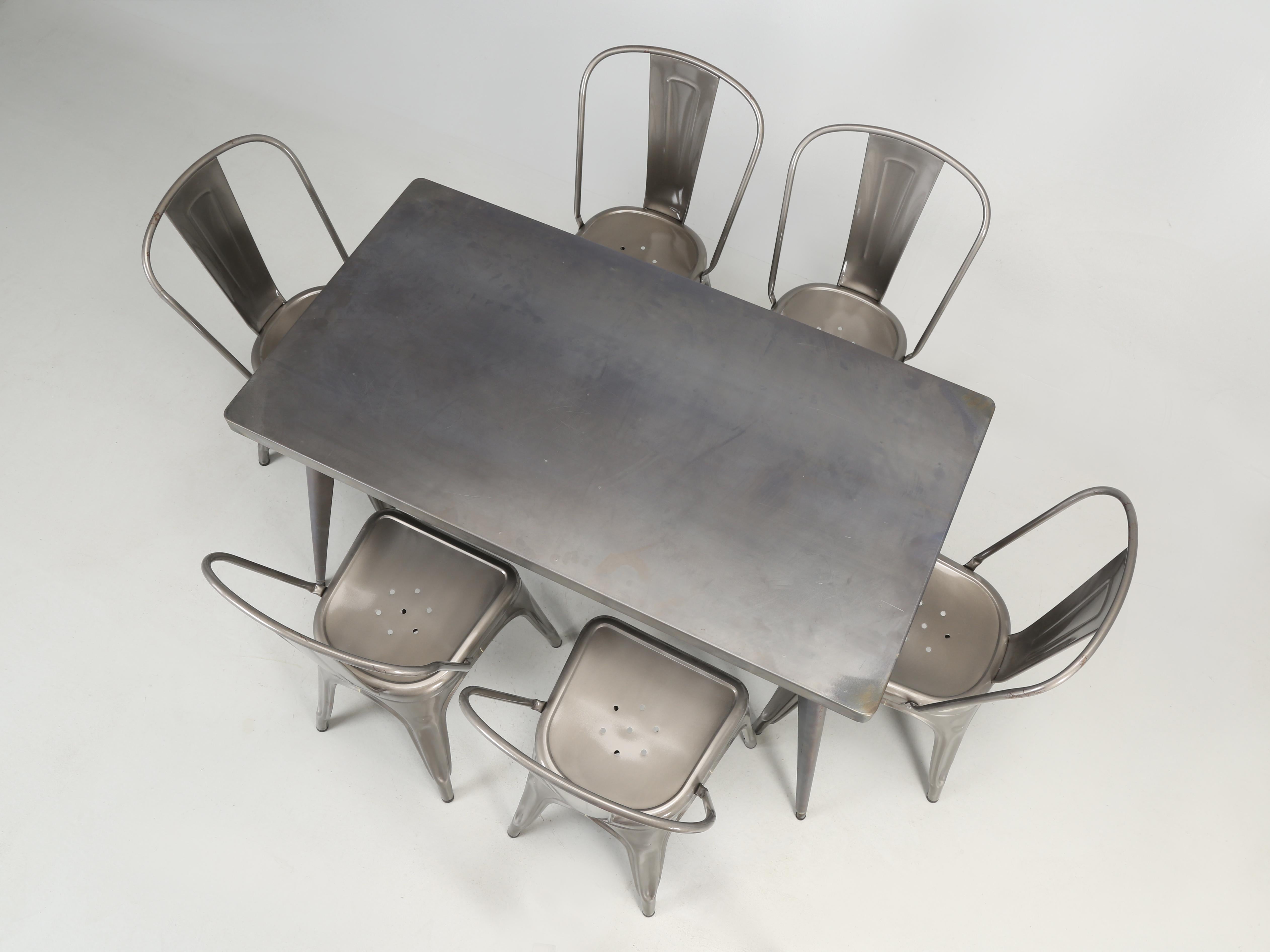 Machine-Made Genuine French Tolix Table in Raw Steel with '6' Matching Steel Stacking Chairs For Sale