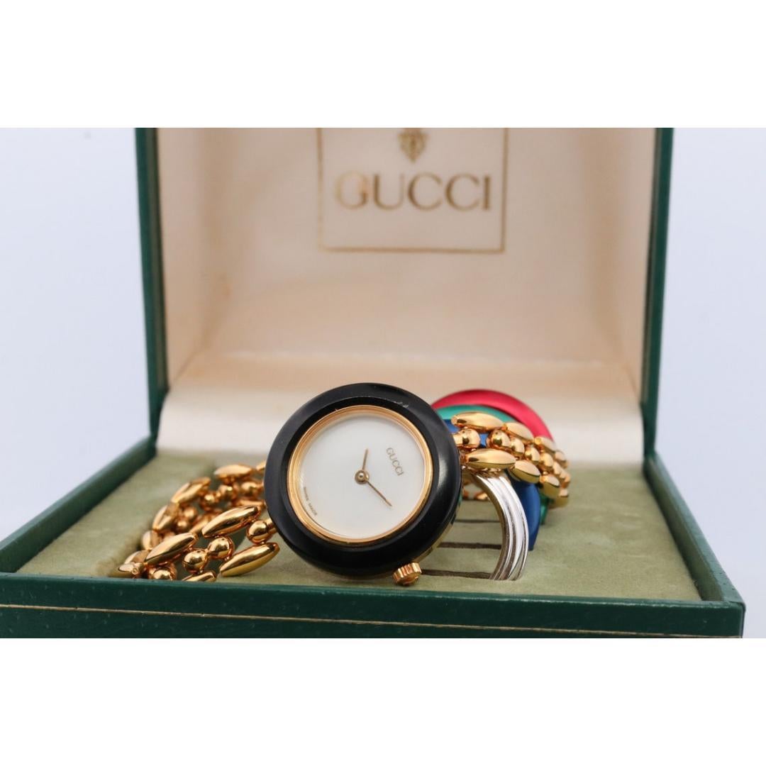 gucci bracelet watch with interchangeable bezels