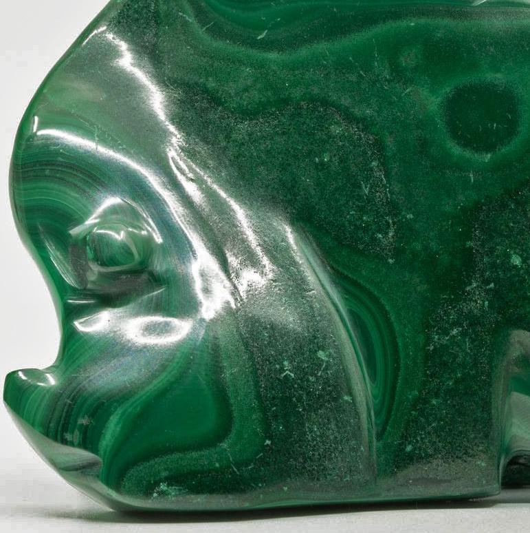 This gorgeous 272 gram malachite fish has been hand carved and hand-polished out of excellent quality malachite from the DRC. Malachite is a lusciously hued, bright and dark green banded copper carbonate mineral that often grows with azurite. Mined