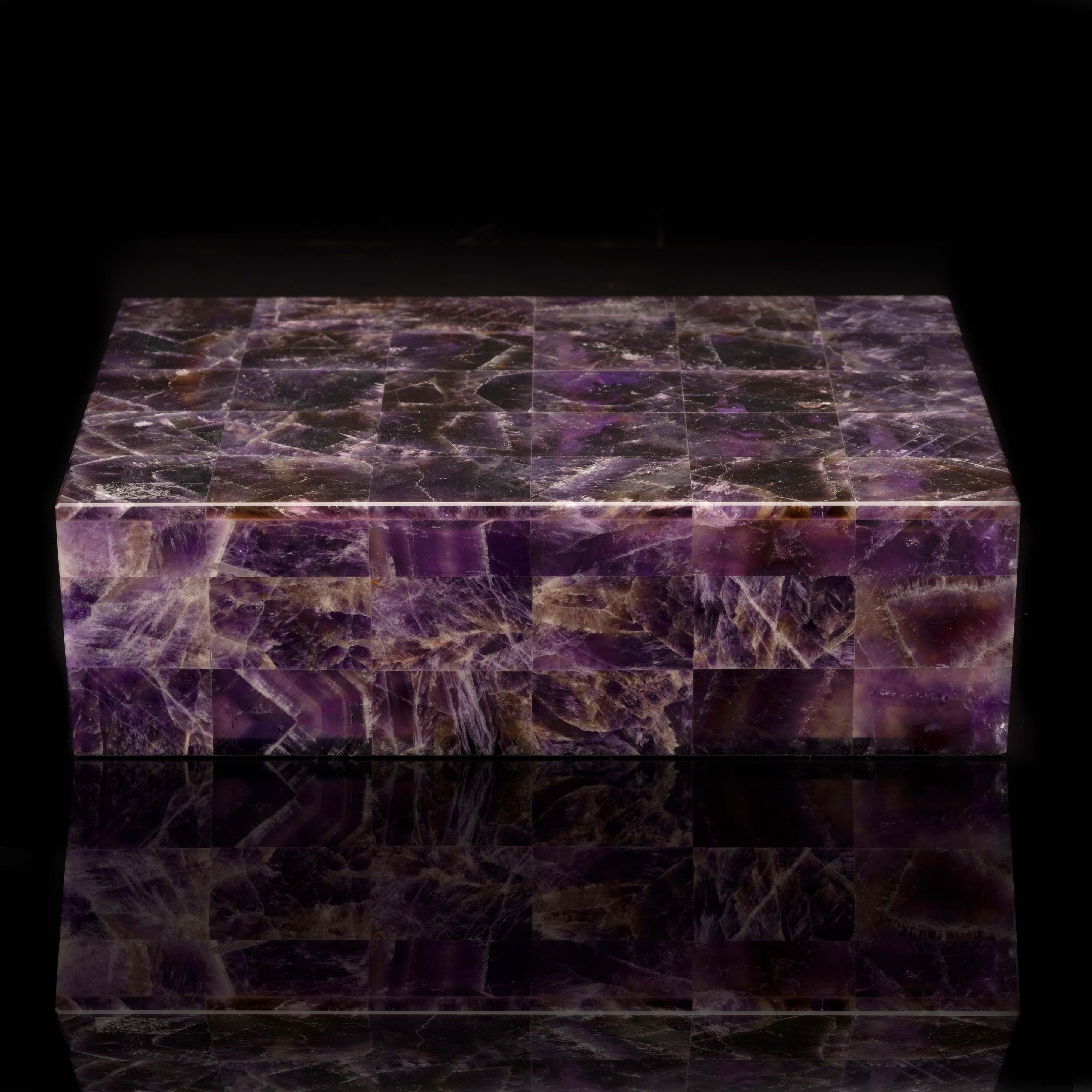 This seamlessly handcrafted box with hinged lid and brass hardware has been hand-carved and carefully hand-assembled in Italy out of the genuine highest quality Uruguayan amethyst boasting an incredibly deep purple color and singularly gemmy