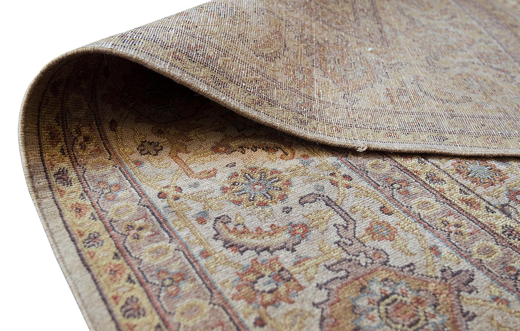 A beautiful classic Tabriz created in Kashmir featuring a masterful color combination and an extremely fine detailed workmanship. 100% natural wool pile. Brand new.