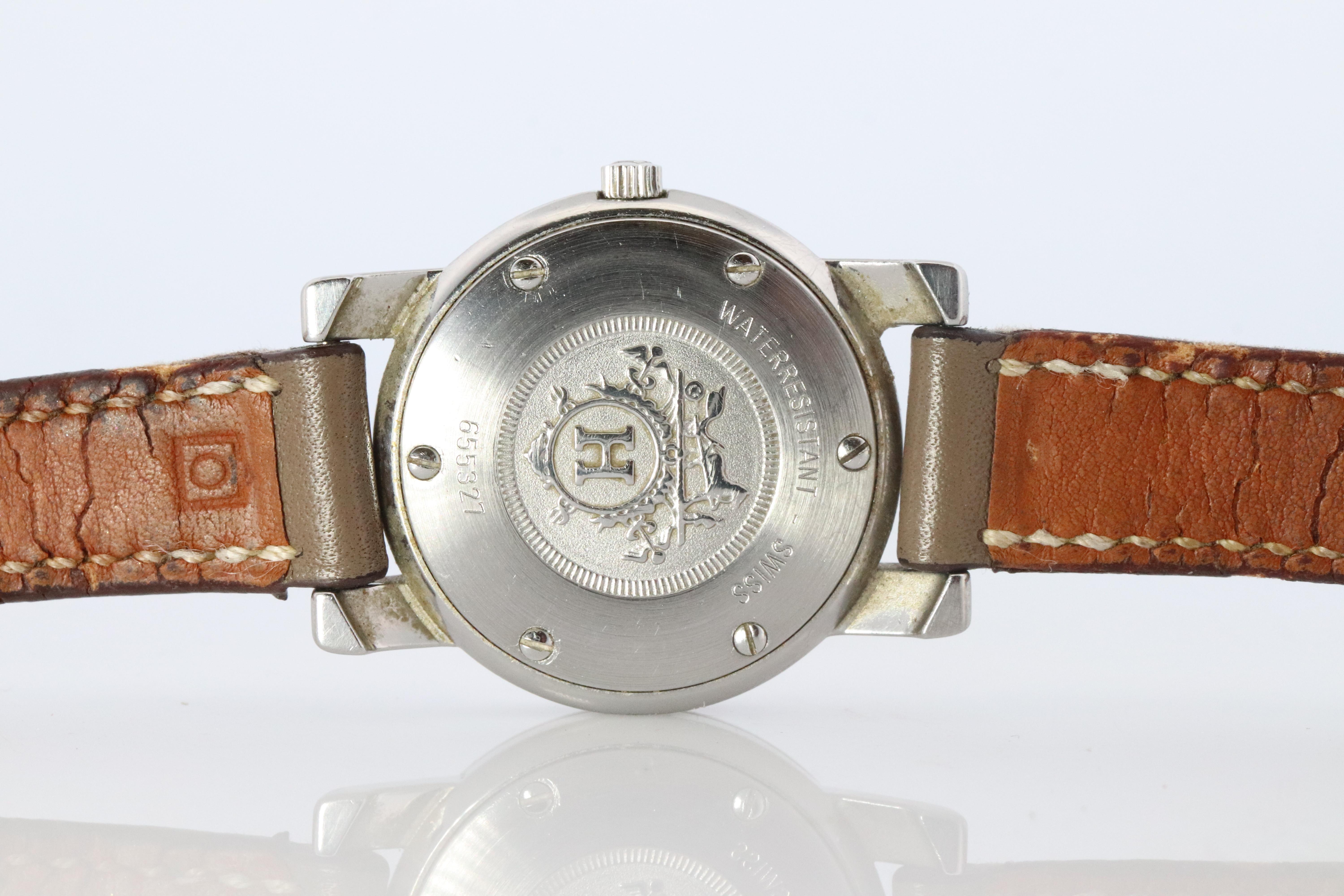 Véritable HERMES Montre Carrick 26mm ronde à quartz cadran blanc en vente 1