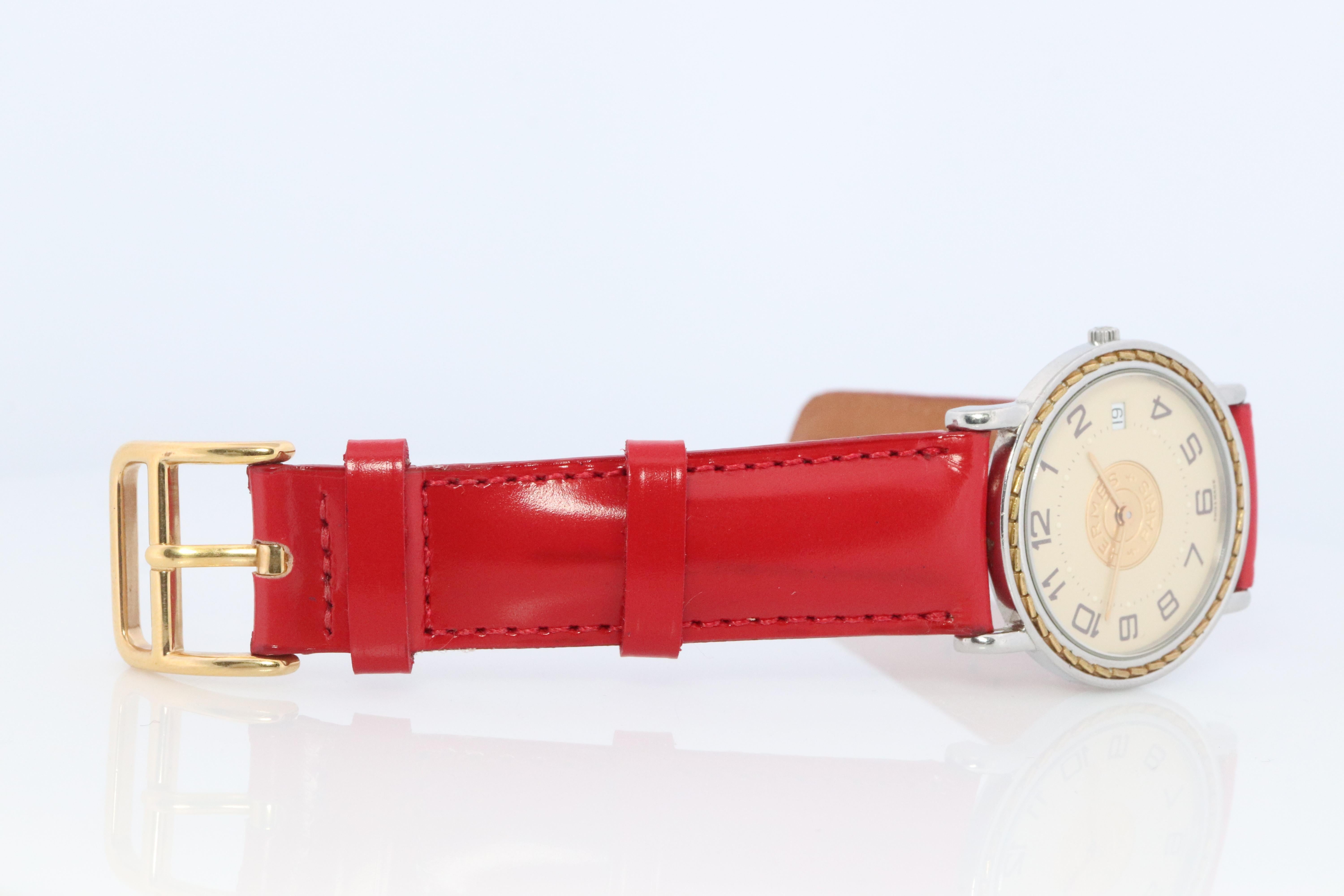 Genuine HERMES Sellier 32mm Round SS and 18k Quartz Watch White Dial. In Good Condition For Sale In Port Charlotte, FL
