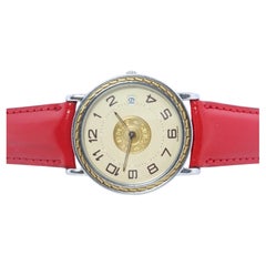 Auténtico Reloj HERMES Sellier 32mm Redondo SS y Cuarzo 18k Esfera Blanca.