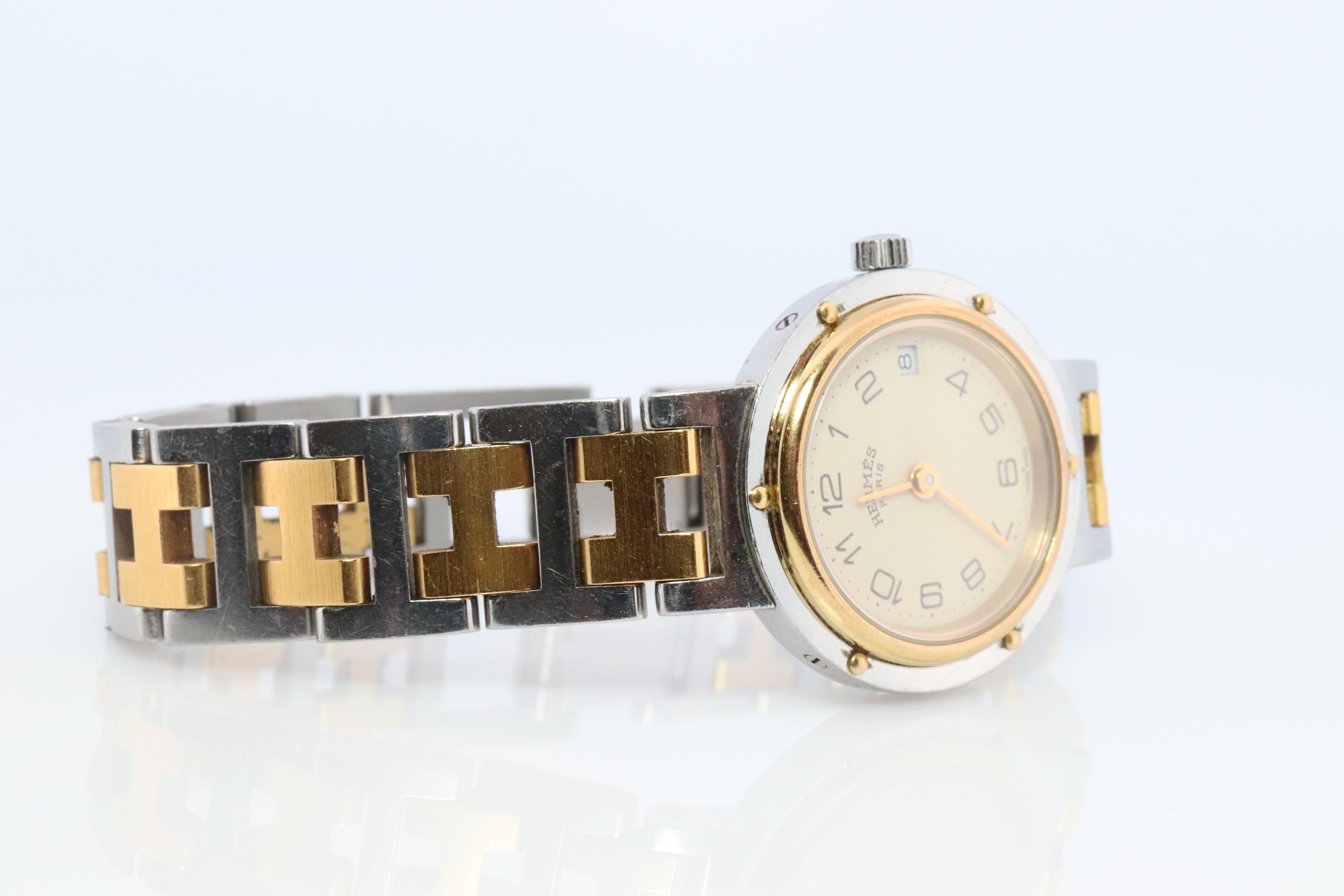 Genuine HERMES Stainless Steel 24mm Round Clipper Quartz Watch Champagne. In Good Condition In Port Charlotte, FL