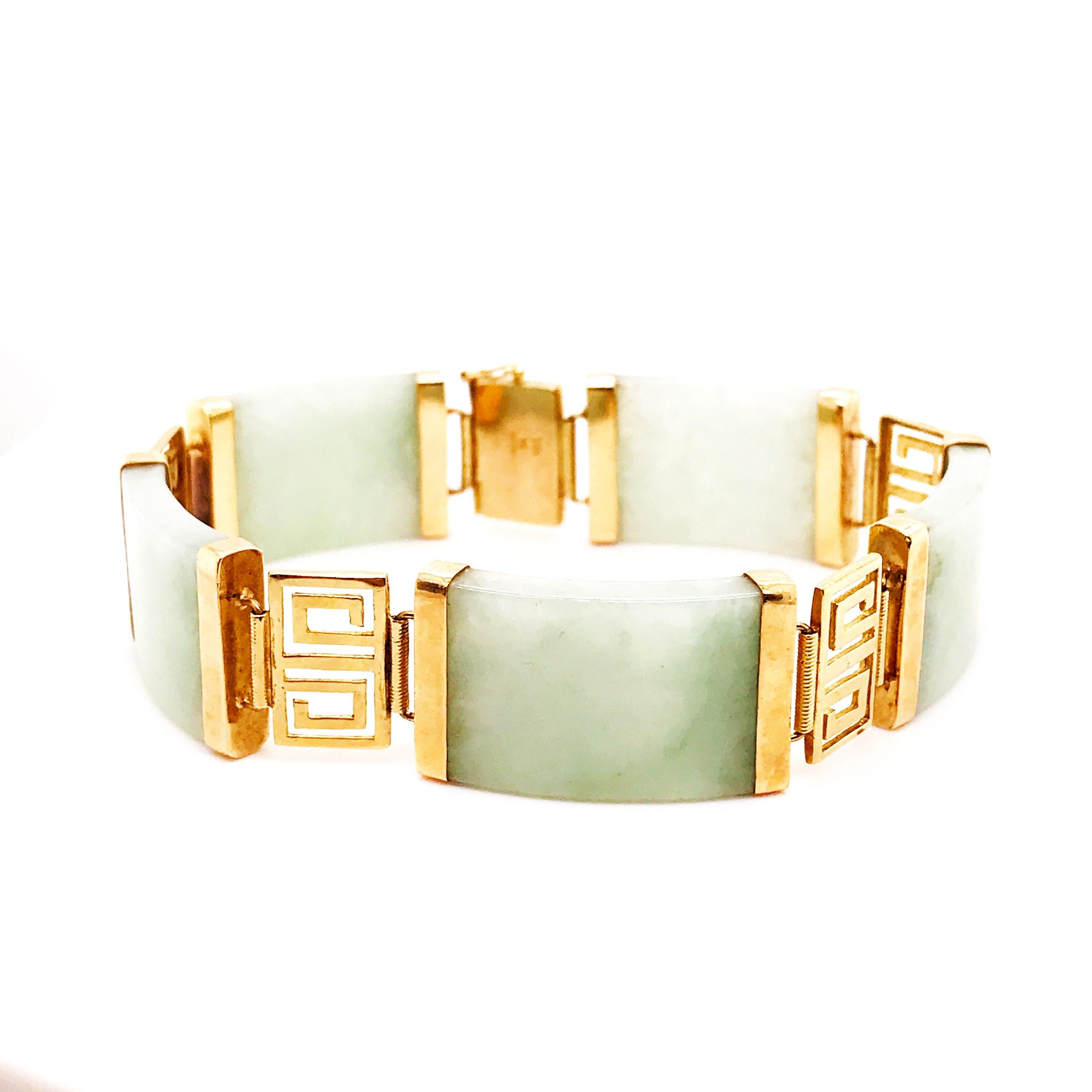 Genuine Jade Chinese Good Luck Bracelet. With 5 rectangular pieces of genuine jade held together with 14k yellow gold caps. There are Chinese symbol links in between each piece of genuine jade representing good fortune, luck and unity. This bracelet