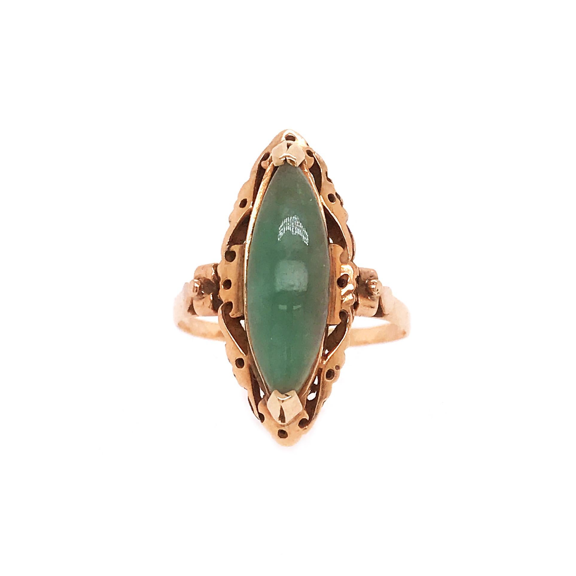 This gorgeous piece of jade is so special and believed to bring luck. A piece of jade like this deserves the best setting. The yellow gold setting was hand fabricated specifically for this gemstone. The jade is set in two 