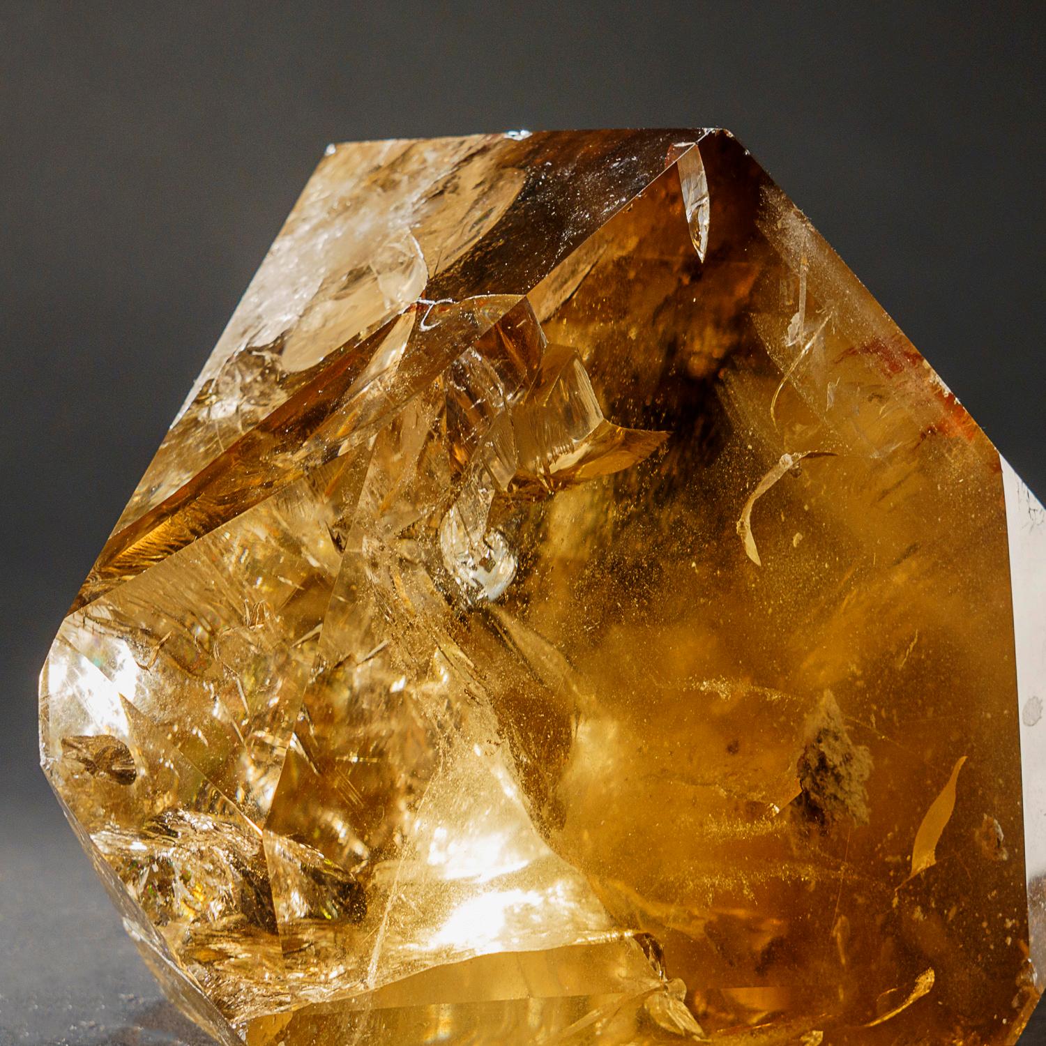 Museum-quality, large crystal of transparent Smoky Quartz point with perfectly terminated face. This world-class crystal point is internally flawless, with top luster and excellent natural smoky yellow color.

Smokey Quartz works with all of the
