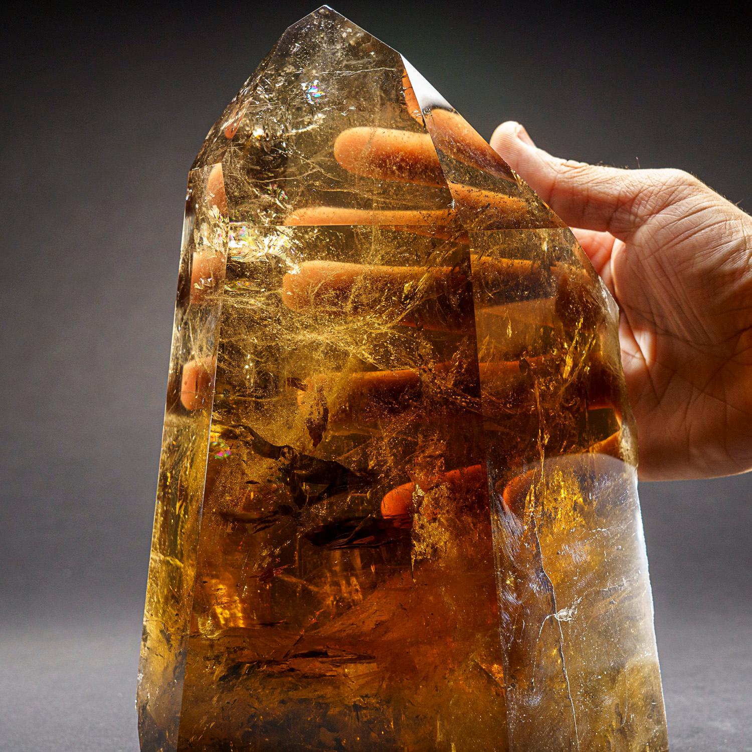 Museum-quality, large crystal of transparent Smoky Quartz point with perfectly terminated face. This world-class crystal point is internally flawless, with top luster and excellent natural smoky yellow color.

Smokey Quartz works with all of the