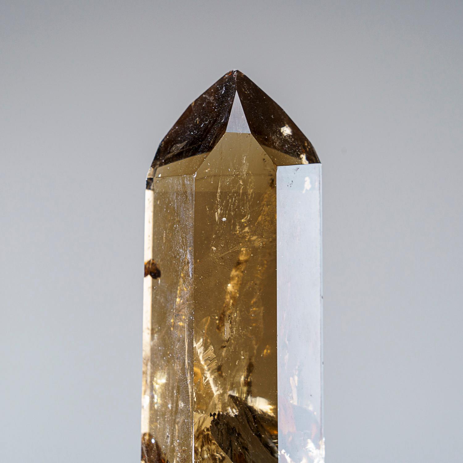 Museum-quality, large crystal of transparent Smoky Quartz point with perfectly terminated face. This world-class crystal point is internally flawless, with top luster and excellent natural smoky yellow color.


Smokey Quartz works with all of the