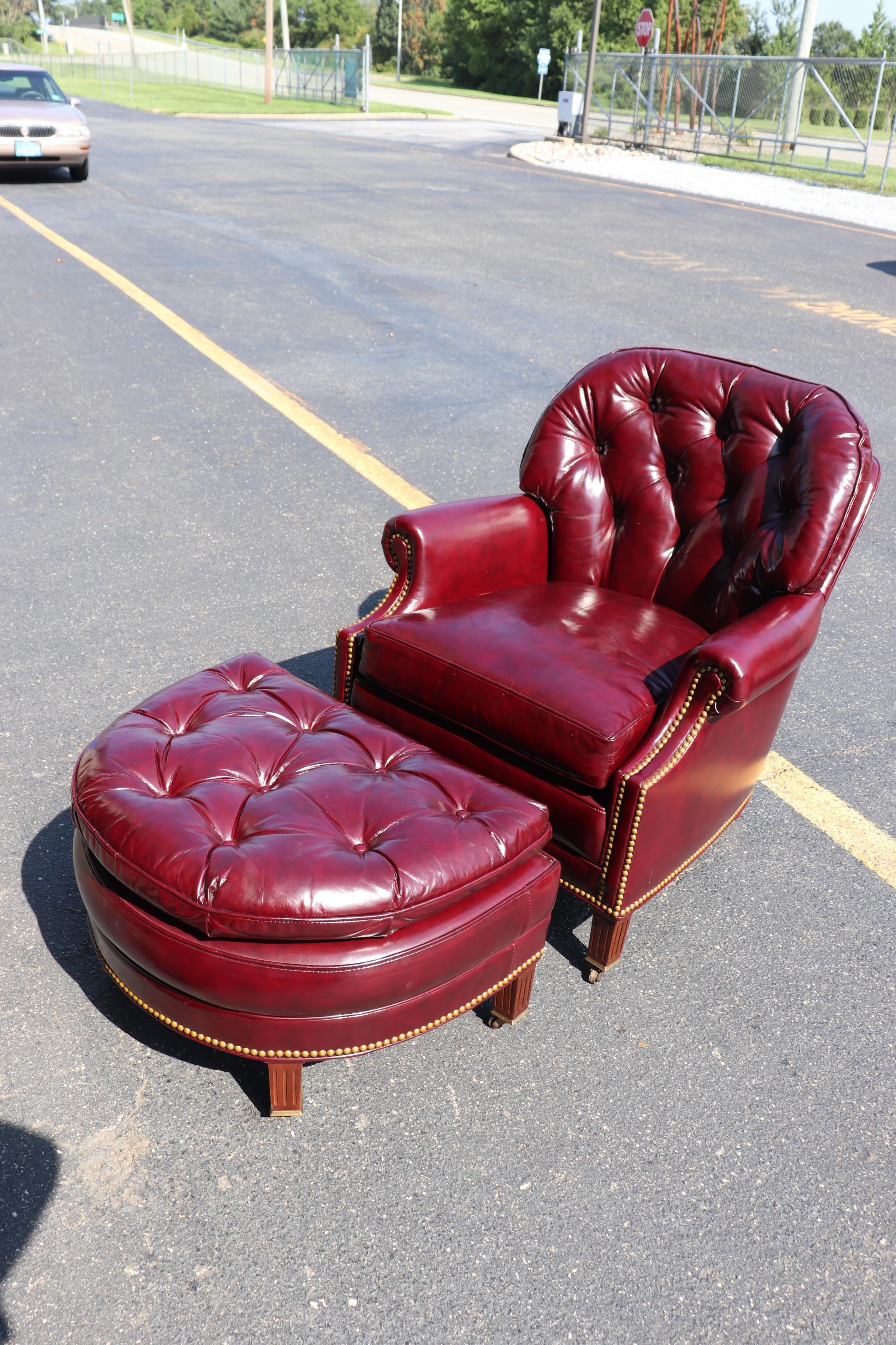 This is a stunning and absolutely superb quality leather and ottoman set by Hancock and Moore. The condition of the rich burgundy leather is outstanding and there are few defects other than normal wear from use that are shown in the photos. No