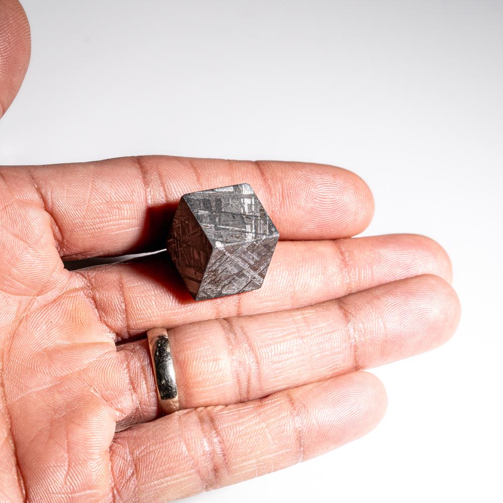 Genuine Muonionalusta Meteorite mini Cube from Norrbotten, Sweden.

The Muonionalusta is a meteorite classified as fine octahedrite, type IVA (Of) which impacted in northern Scandinavia, west of the border between Sweden and Finland, about one