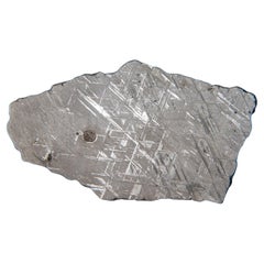 Une tranche de météorite authentique Muonusta (385 grammes)