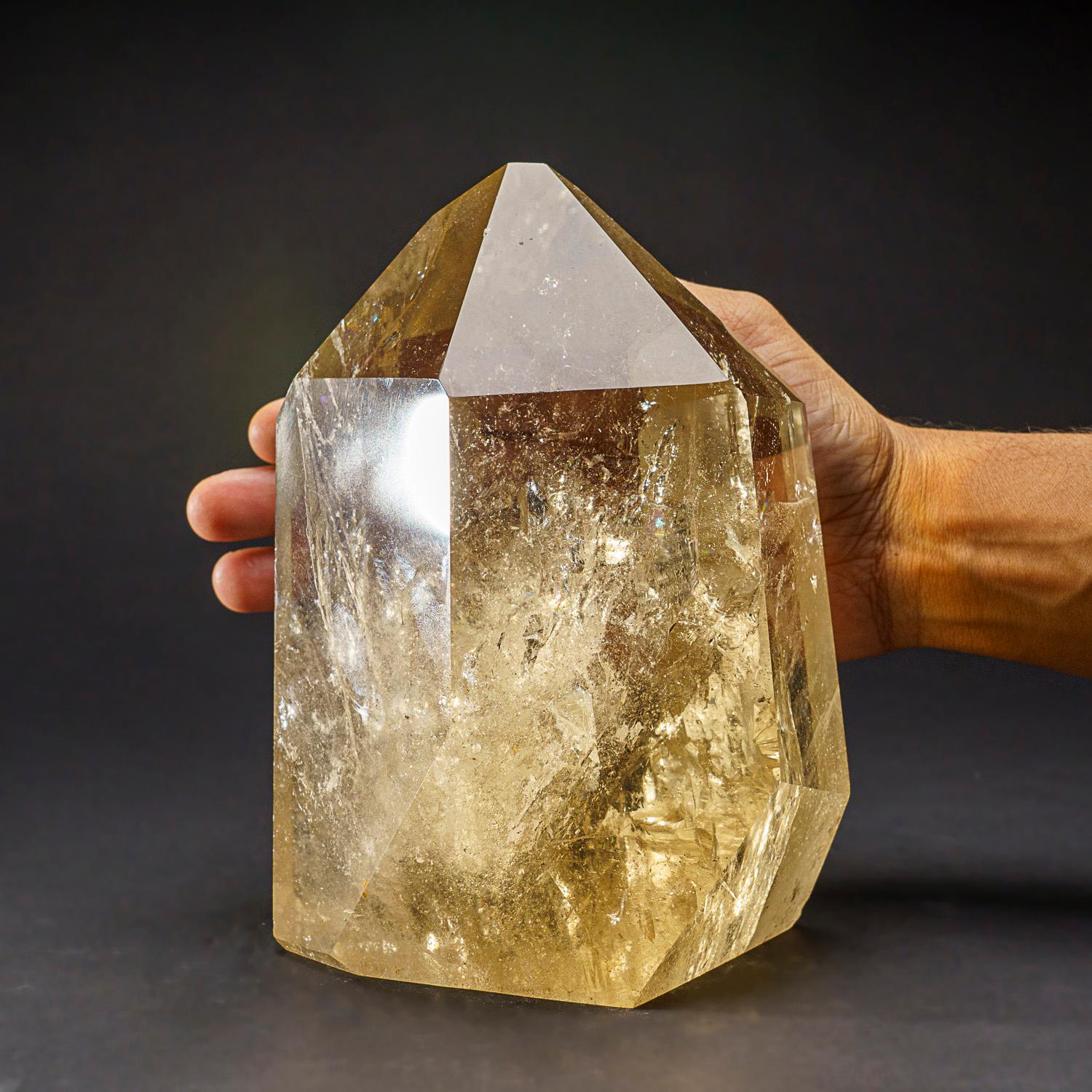 Museum-quality, large crystal of transparent Citrine quartz point with perfectly terminated faces. This world-class point is extremely large, with top luster and excellent natural smoky yellow color, internally this crystal is flawless.

Citrine can