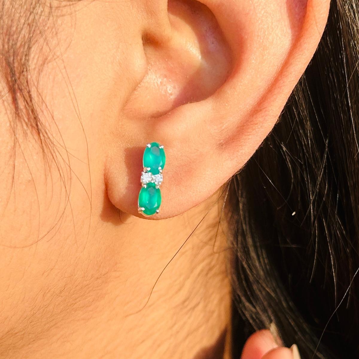 Genuine Natural Emerald Oval Stud Earrings in sterling silver to make a statement with your look. You shall need stud earrings to make a statement with your look. These earrings create a sparkling, luxurious look featuring oval cut natural emerald