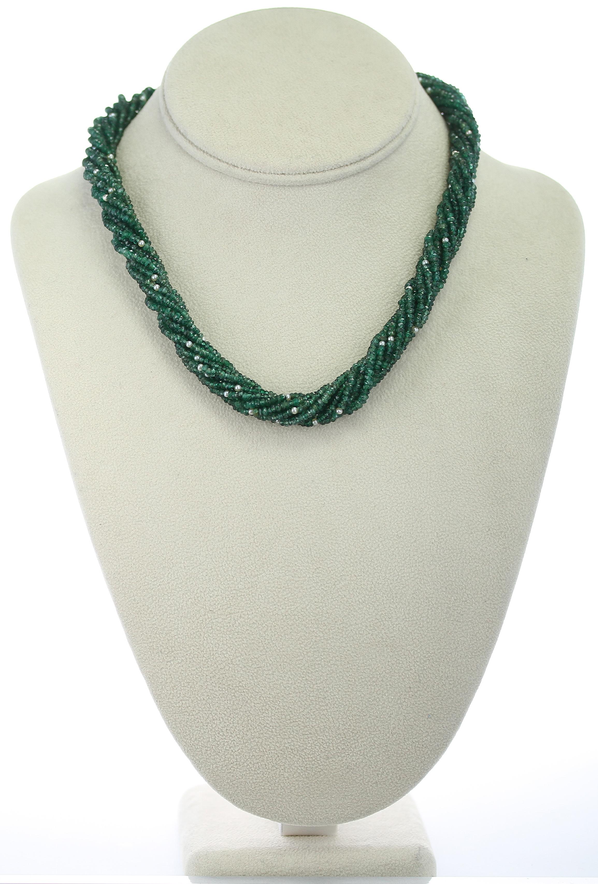 A Genuine & Natural Faceted Emerald Beads with Pearls Choker Necklace consisting of 10 Lines, weighing 252 carats. The length is 18