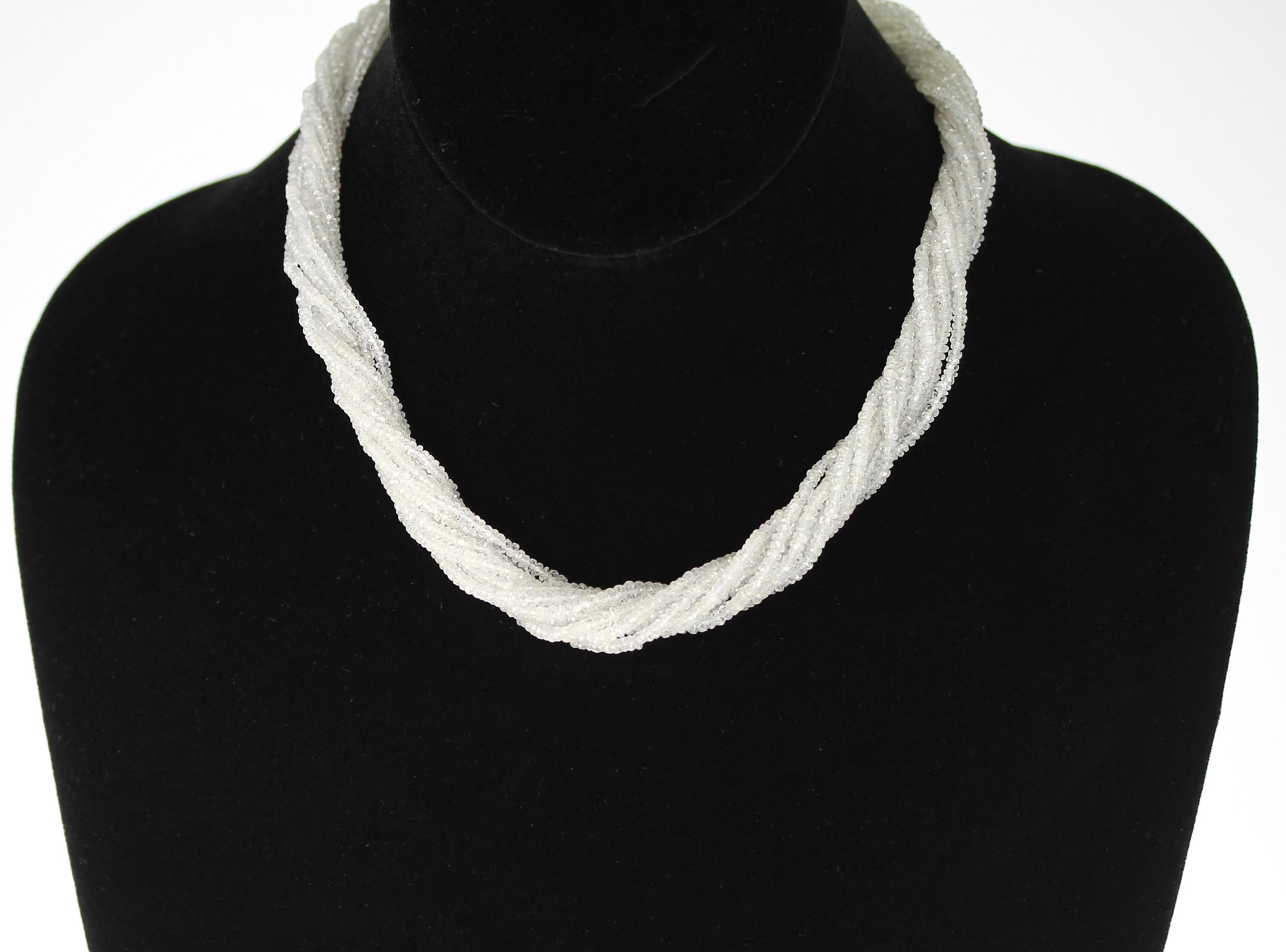 A Genuine & Natural White Sapphire Faceted Beads Choker Necklace with 10 Strands and an 18K White Gold Clasp. The necklace weighs 268 carats, the length is 16 inches, and the beads range from 2MM to 3MM. 
We can also customize the necklace according