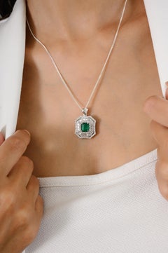 Genuine Octagon Emerald Pendant with Diamond Halo in 18k White Gold