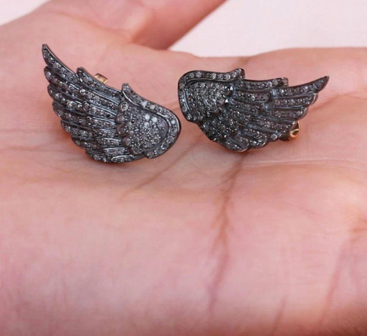 Orecchino con ali d'angelo con diamante autentico in pavé in argento 925. in vendita 1
