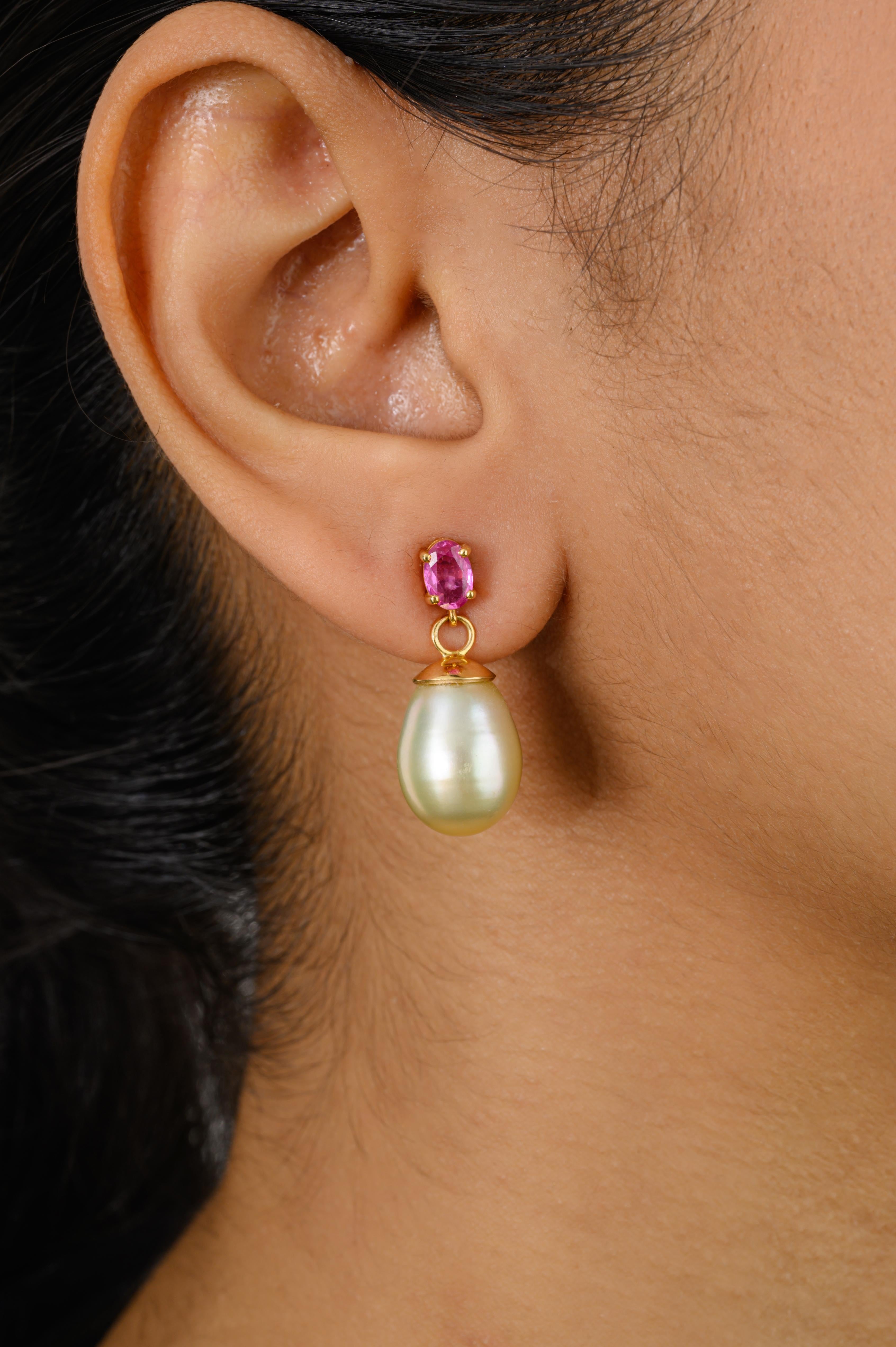 Genuine Pink Sapphire South Sea Pearl Drop Earrings for Grandma in 18K Gold to make a statement with your look. These earrings create a sparkling, luxurious look featuring oval cut pink sapphire and drop pearl.
Sapphire stimulate concentration and