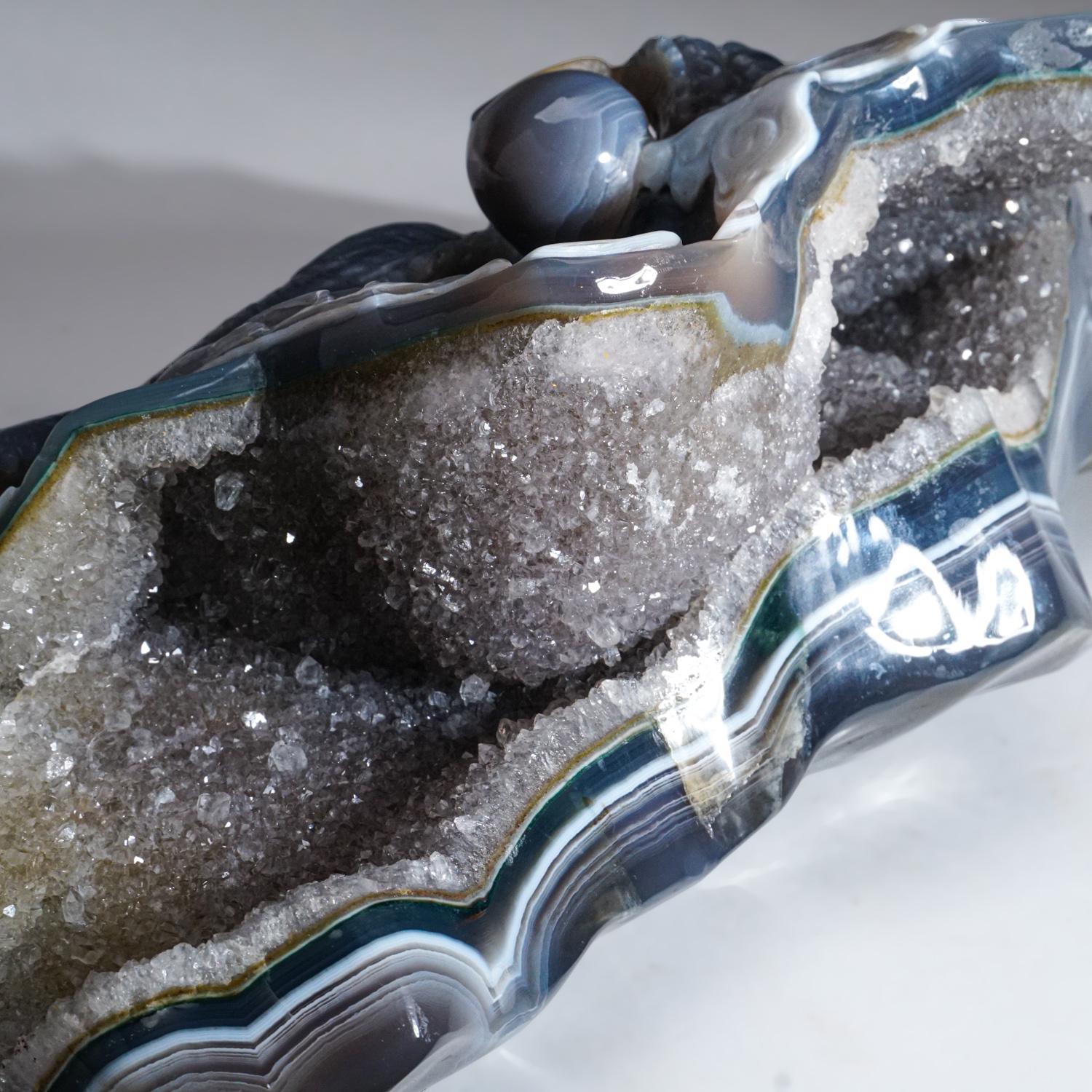 The German artisan of this piece used this gem quality, banded agate to truly highlight the quality of the stone. Carved from a single piece of incredibly transparent banded agate (sourced in Uruguay), the variation in color creates spectacular