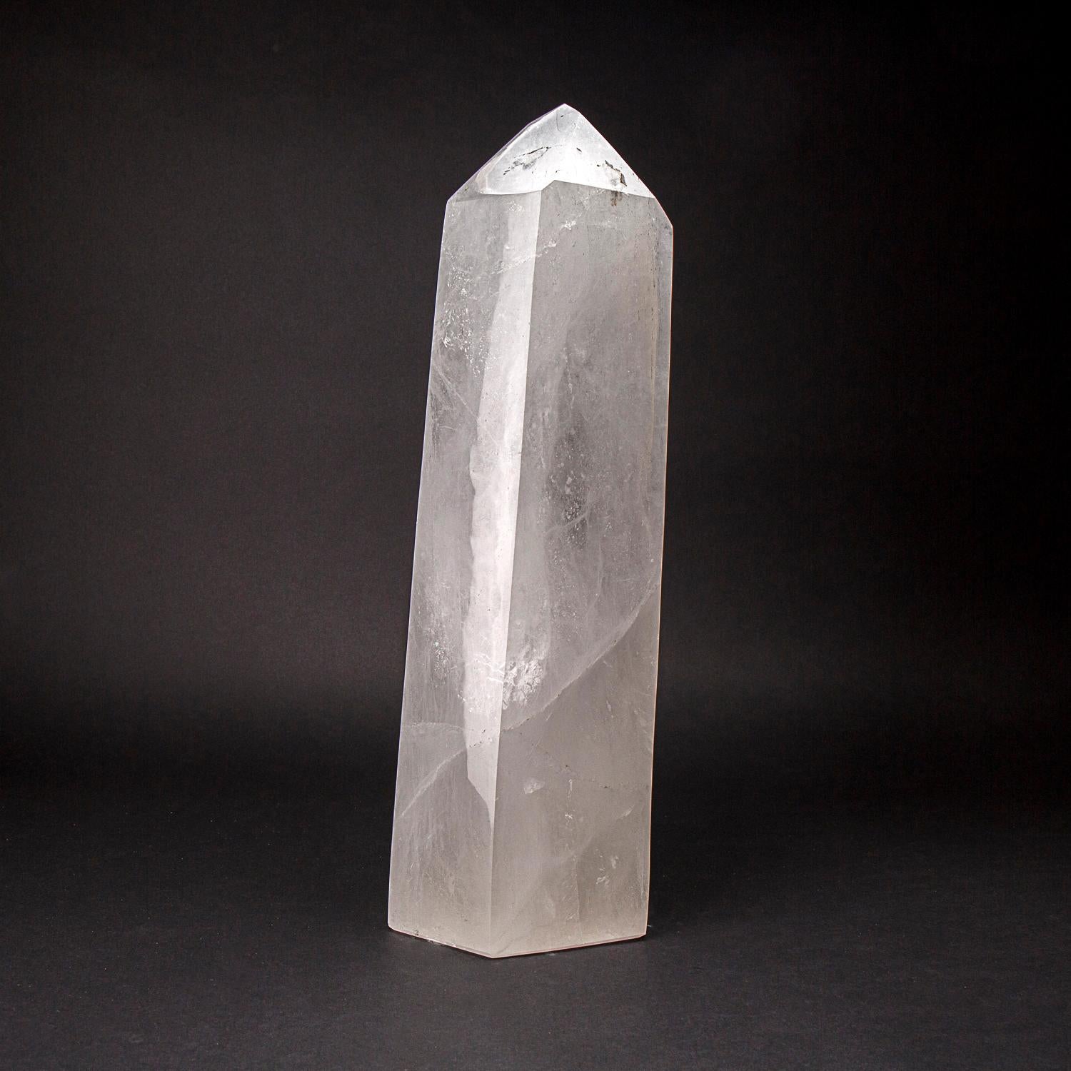 This Brazilian clear quartz crystal obelisk is of top museum quality, with a polished mirror finish on all sides. Known as the 