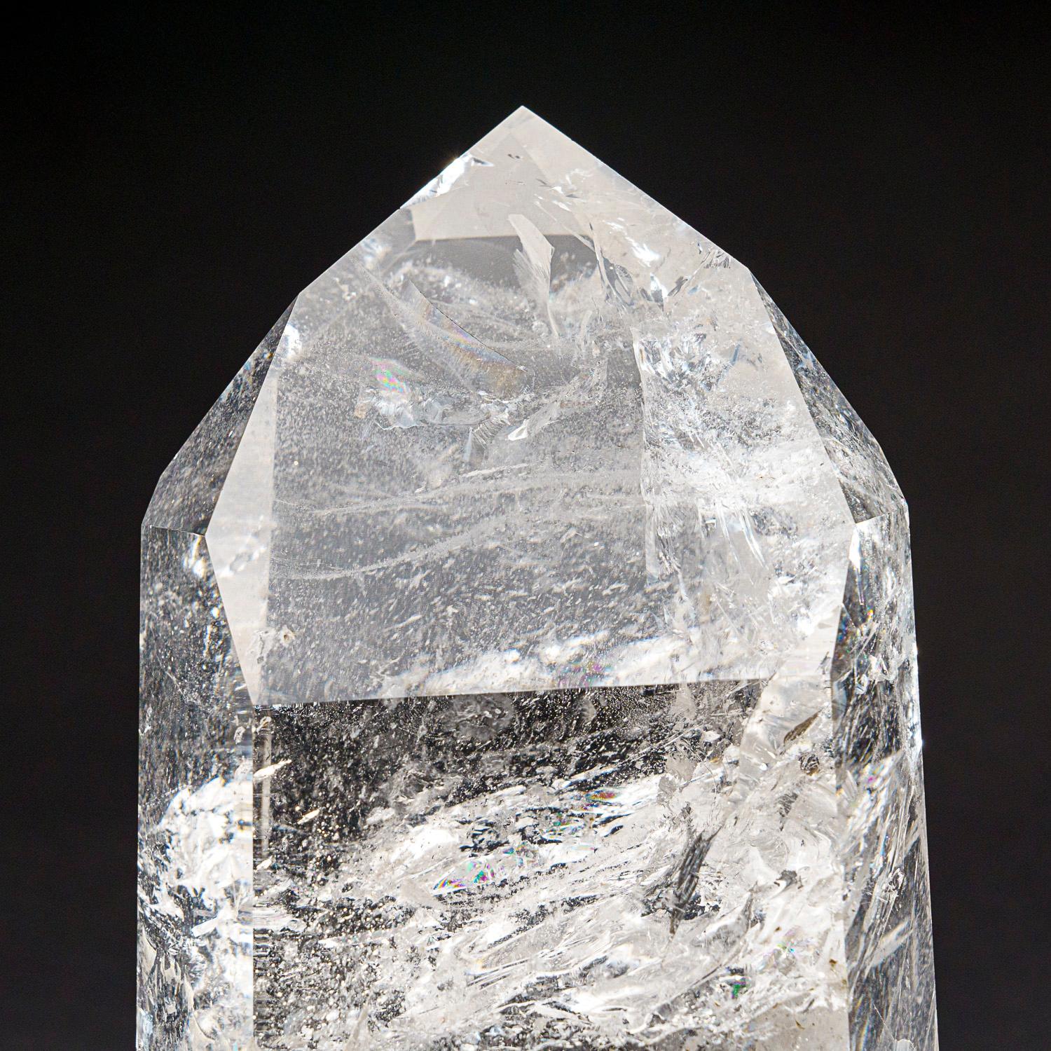 This Brazilian clear quartz crystal point is of top museum quality, with a polished mirror finish on all sides. Known as the 
