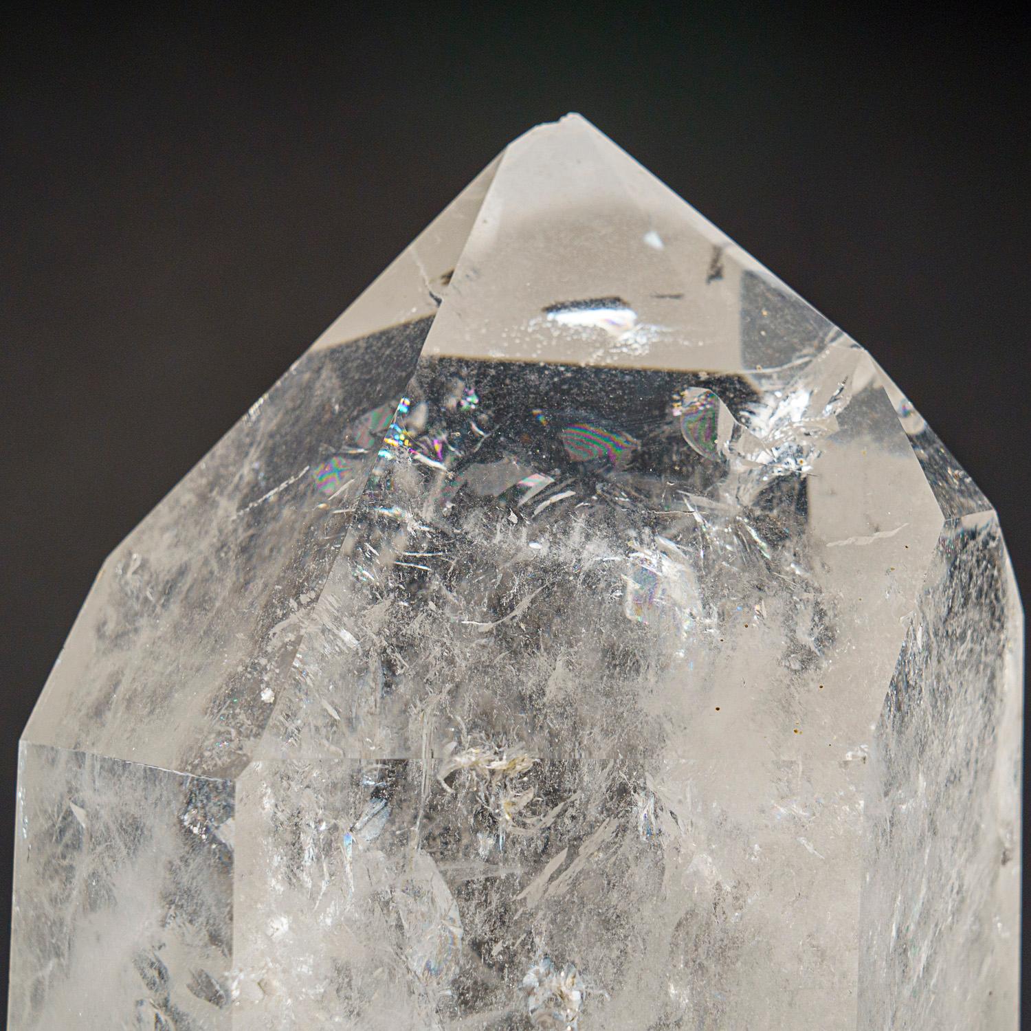 This Brazilian clear quartz crystal point is of top museum quality, with a polished mirror finish on all sides. Known as the 