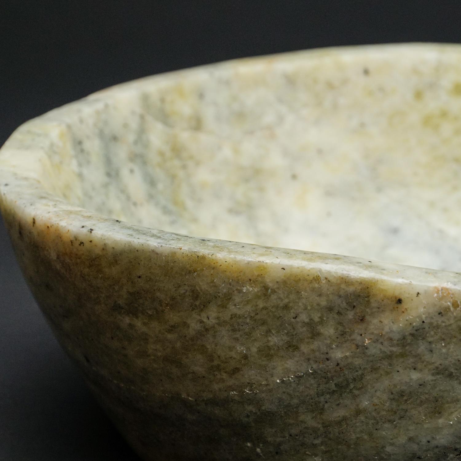 Beautiful one-of-a-kind, free-form Serpentine bowl carved out of a single chunk of Green Serpentine. This will make a beautiful centerpiece to complement your home and polished to a mirror finish. This incredible piece is polished to a mirror