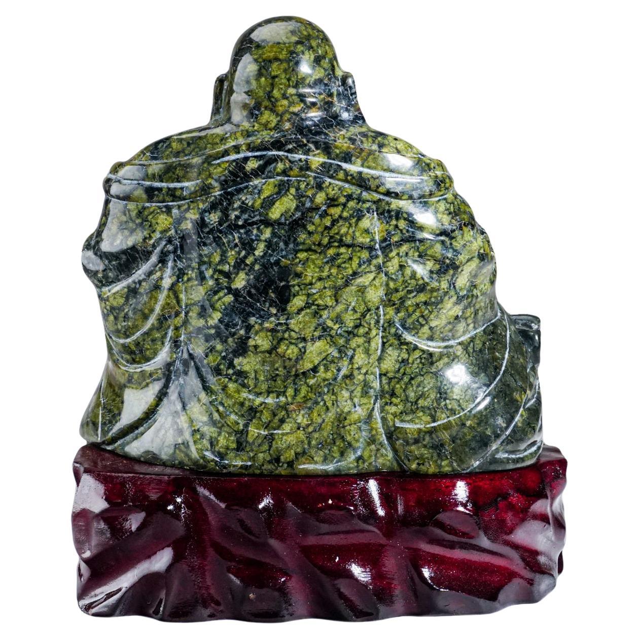 Bouddha en jade néphrite authentique, poli et sculpté à la main (7 lbs)

Grande sculpture à la main de Bouddha sur un présentoir en bois. Cette pièce est sculptée à la main à partir d'un solide morceau de jade néphrite qui est poli à la main pour