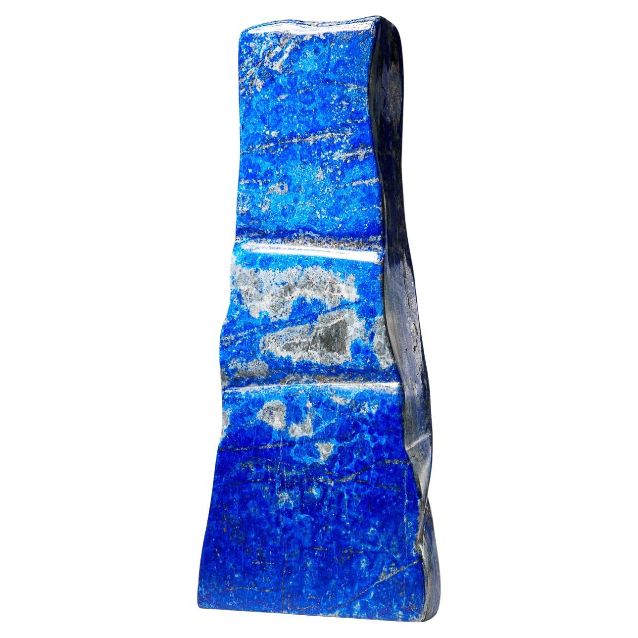 Beautiful hand polished freeform of AAA quality natural Afghani lapis lazuli. This specimen has rich, electric-royal blue color enriched with scintillating pyrite micro-crystals.

Lapis Lazuli is a powerful crystal for activating the higher mind