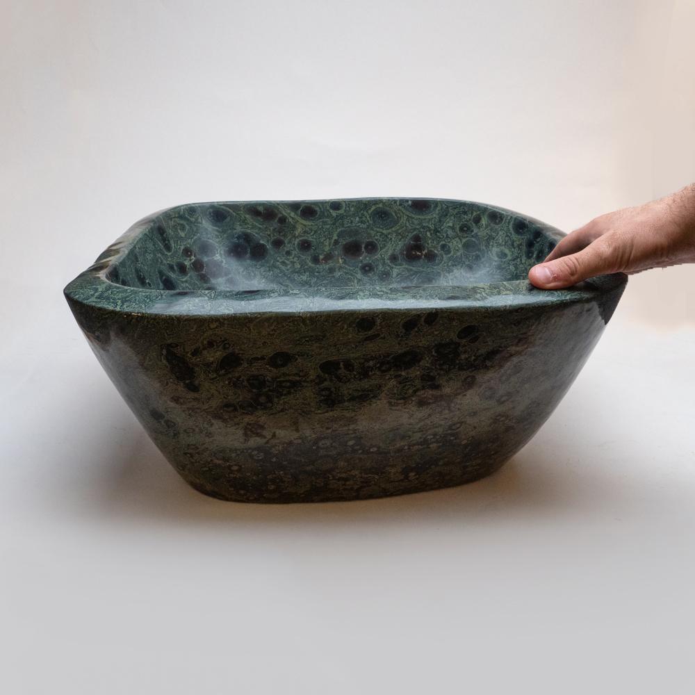 A beautiful handmade Kambaba Jasper carved large bowl, hand polished from a solid piece of Kambaba. This piece has excellent shine, an amazing pattern and can be used for a variety of purposes.

Kambaba Jasper is also sometimes known as Crocodile
