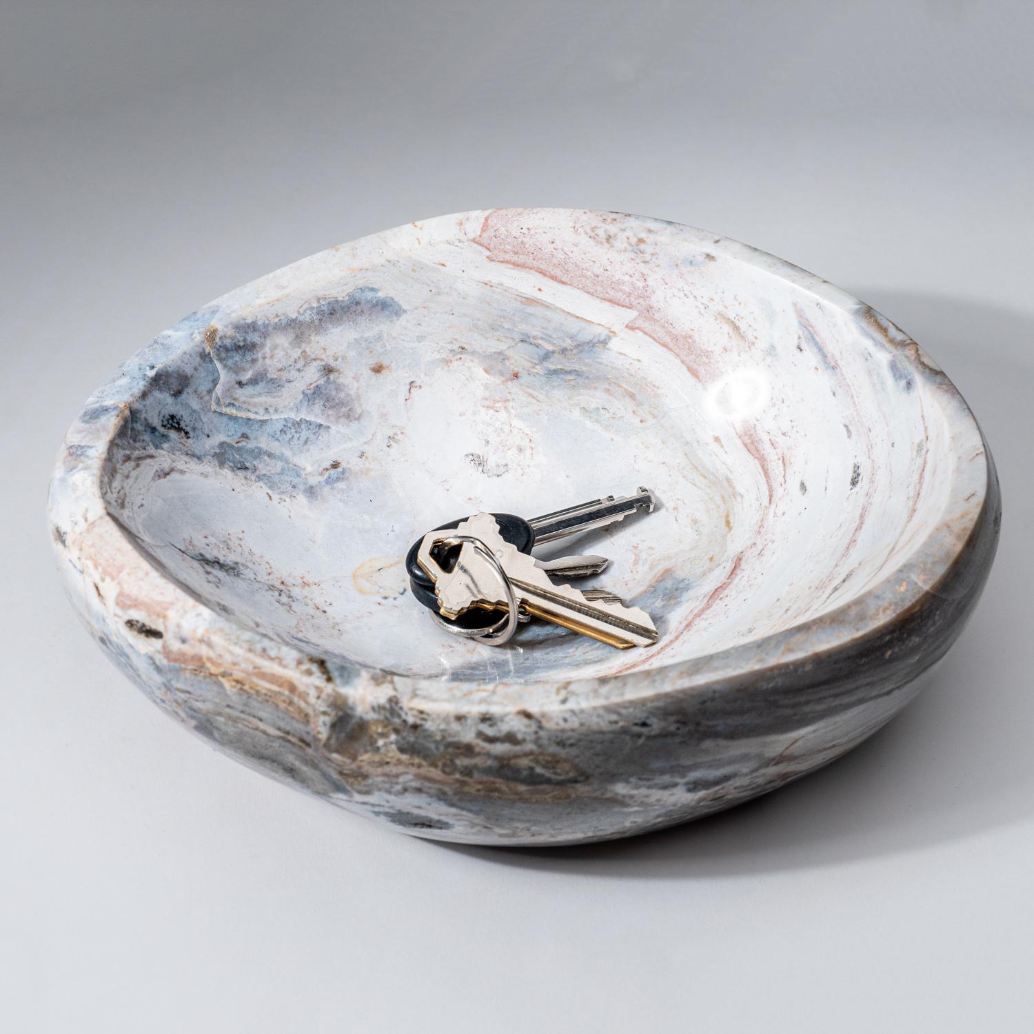 Beautiful one-of-a-kind, free-form ocean jasper bowl from Madagascar. This will make a beautiful centerpiece to complement your home and it's polished to a mirror finish. Ocean Jasper is considered highly restorative for tissue deterioration of the