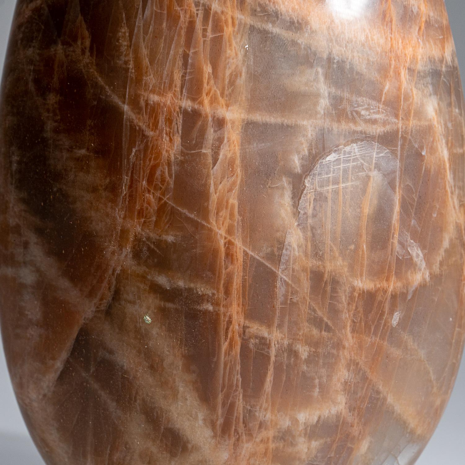 AAA quality, polished Peach Moonstone freeform from Madagascar. Composed of potassium aluminum silicate feldspar, this variety of Moonstone has typically tan-brown to light peach/pink hues. Polished to smooth mirror finish and is a perfect addition