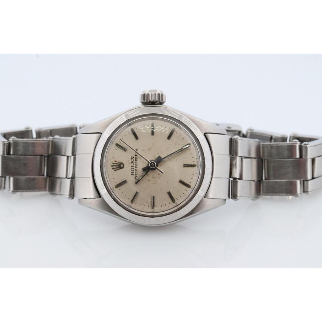 Vintage By aus den 1970er Jahren
MATERIALIEN: Diamant, Edelstahl

Stil: Mitte des Jahrhunderts

Edelstahl Rolex Damen Automatik Uhrwerk Armbanduhr. Ca. 1970er Jahre. 

25mm Rolex Automatikwerk Ref. 6623.

Schöne Uhr.

Gehäuse und Armband sind aus