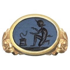 Genuine Roman onyx intaglio (2nd cent. AD) depicting a "marsus" (snake charmer)