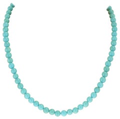 Perles turquoise rondes véritables, or jaune 14 carats