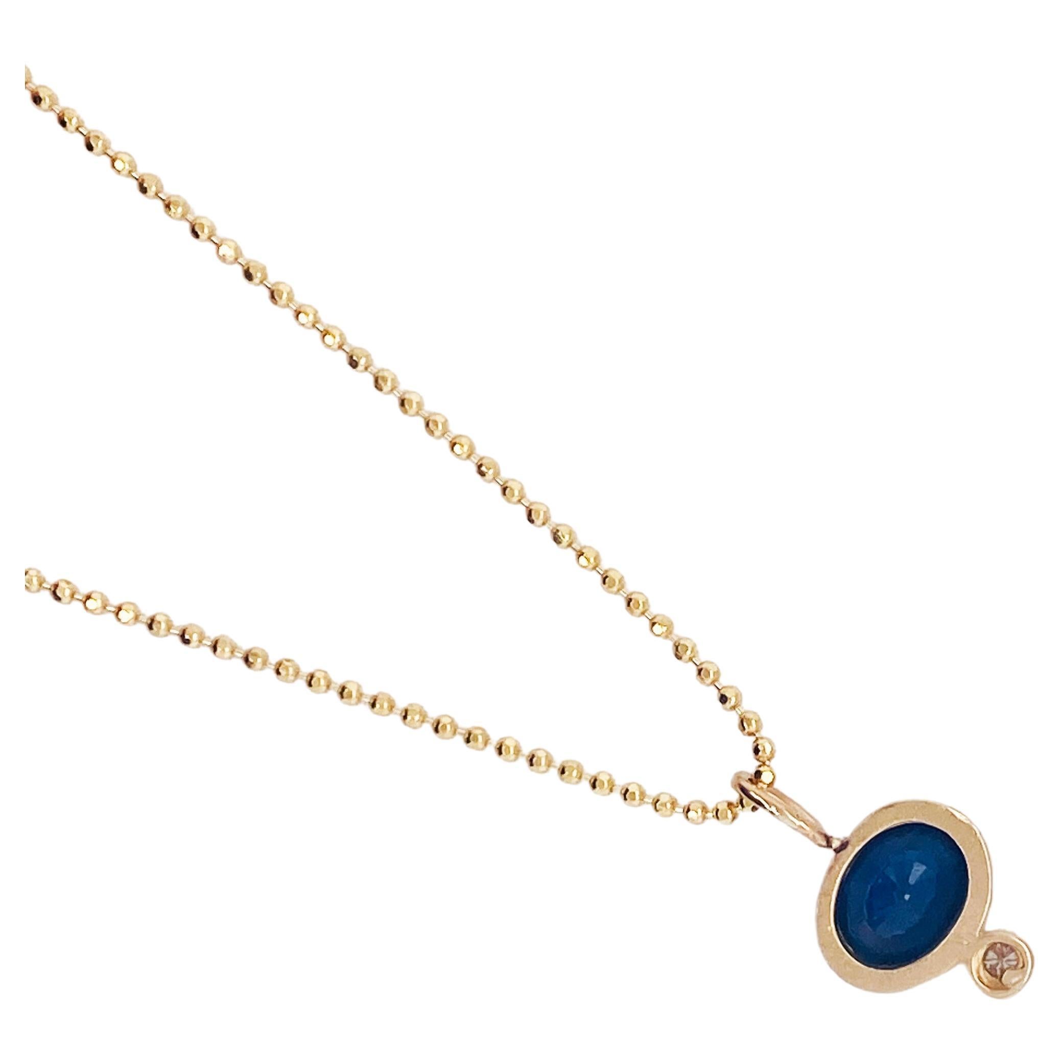 This beautiful sapphire and diamond pendant is so contemporary with its stylish bezel set gemstone and diamond and beaded chain. This is a piece that was handmade and is a one-of-a-kind design from Austin's favorite jewelry store-Five Star Jewelry!